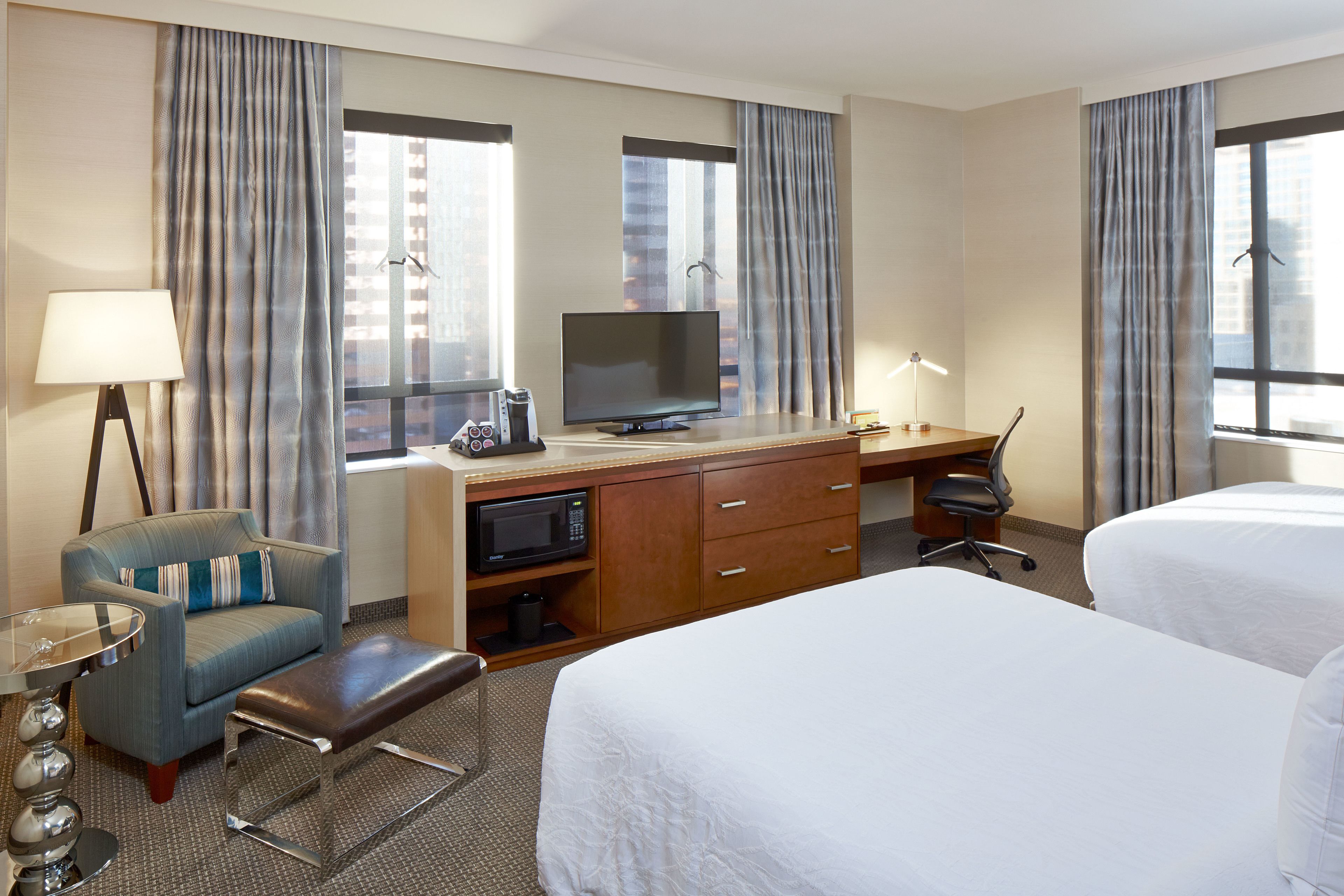 Two Queen beds with a City View