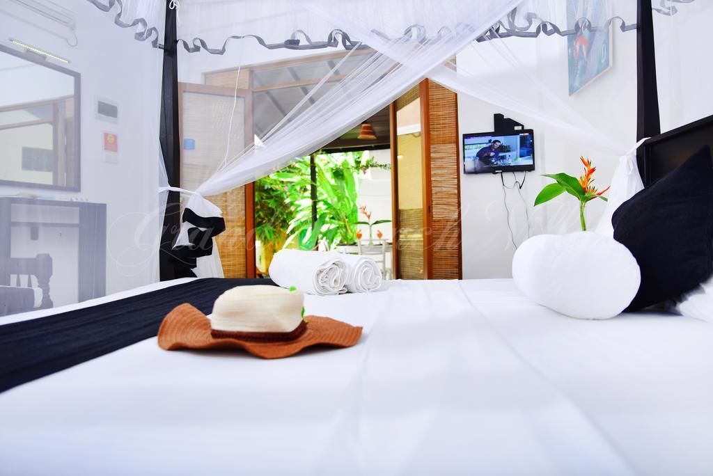 Deluxe Triple Room, Multiple Beds, Accessible, Garden View
