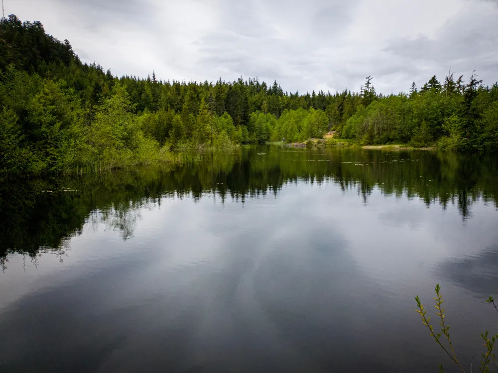 Mow Lake, Qualicum Beach, BC, Canada on a calm, cloudy day