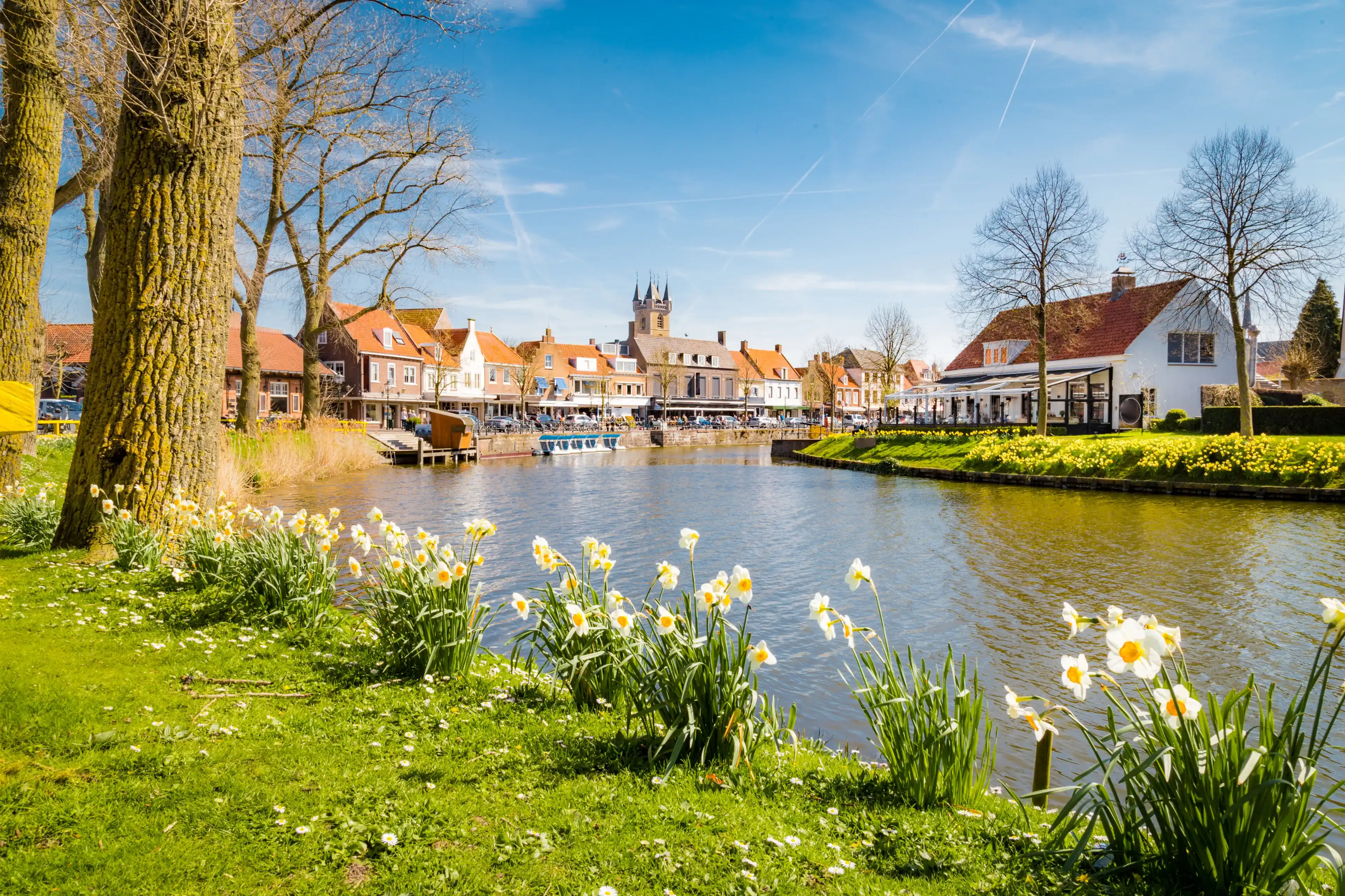 Beautiful view of the historic town of Sluis on a scenic sunny day with blue sky and clouds in spring, Zeelandic Flanders region, Netherlands
