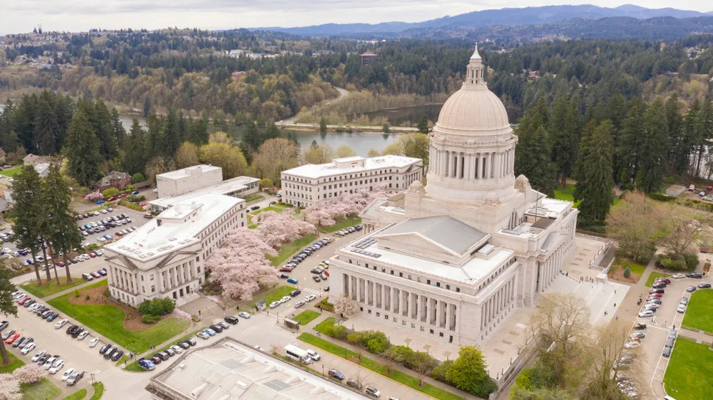 The capitol building in Olympia is adorned by the annual blooming of well placed Cherry Trees