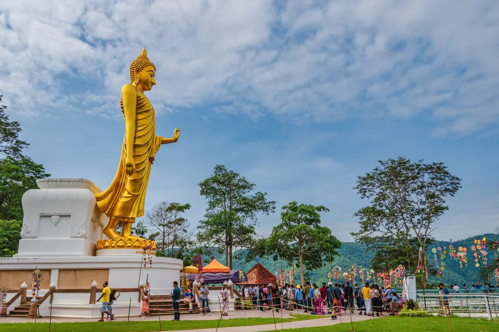 Loei-thailand-23 oct 2020:Unacquainted tourist walking on Chiangkhan Glass skywalk at Phu khok ngio big buddha chiang khan district loei thailand.
