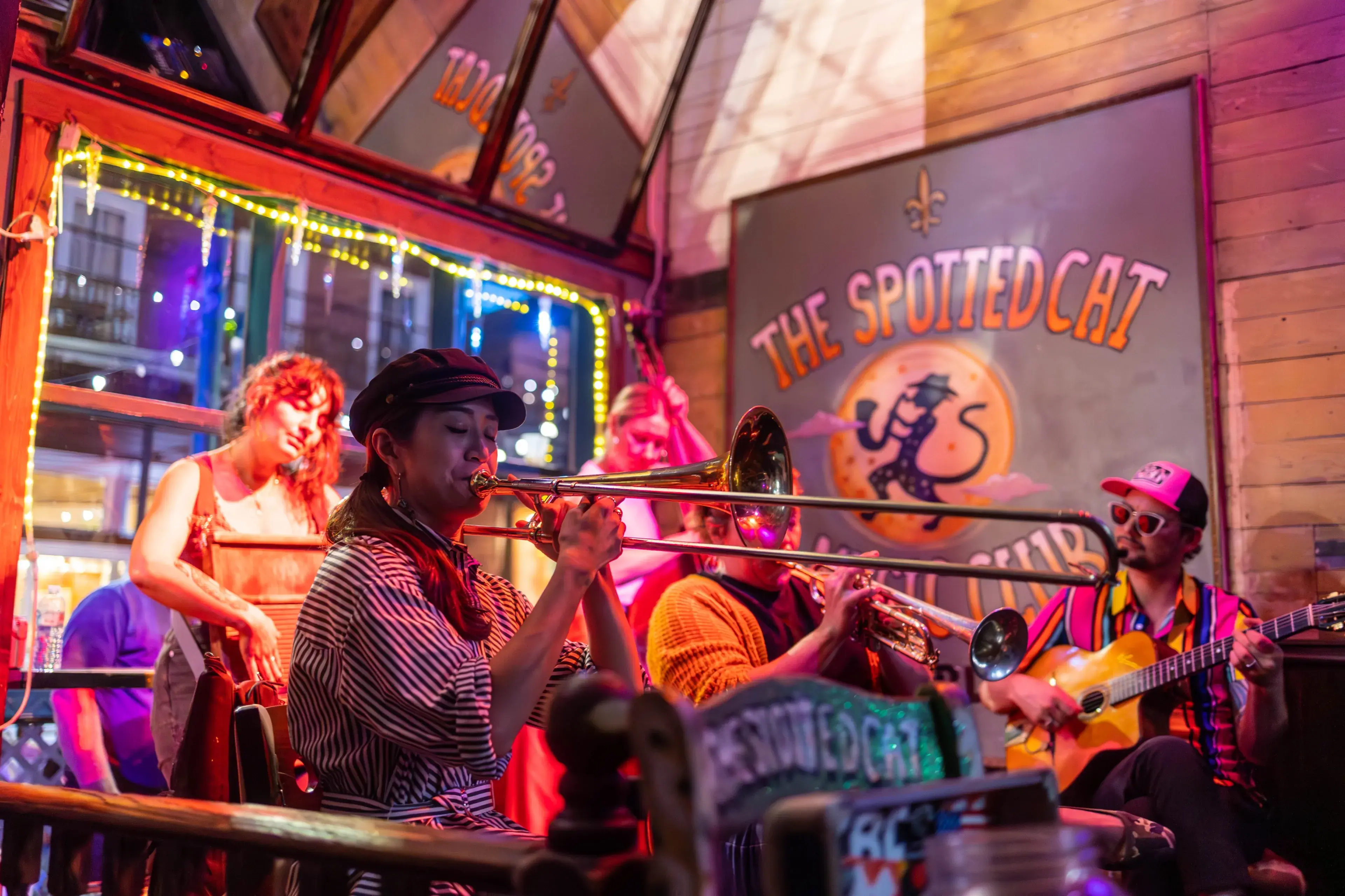 New Orleans USA April 21st 2023: live band playing music a local bar in NOLA during the spring at night. the high energy or the crowd spread across the scene while fun is had through the night New Orleans USA April 21st 2023: live band playing music a local bar in NOLA during the spring at night. the high energy or the crowd spread across the scene while fun is had through the night