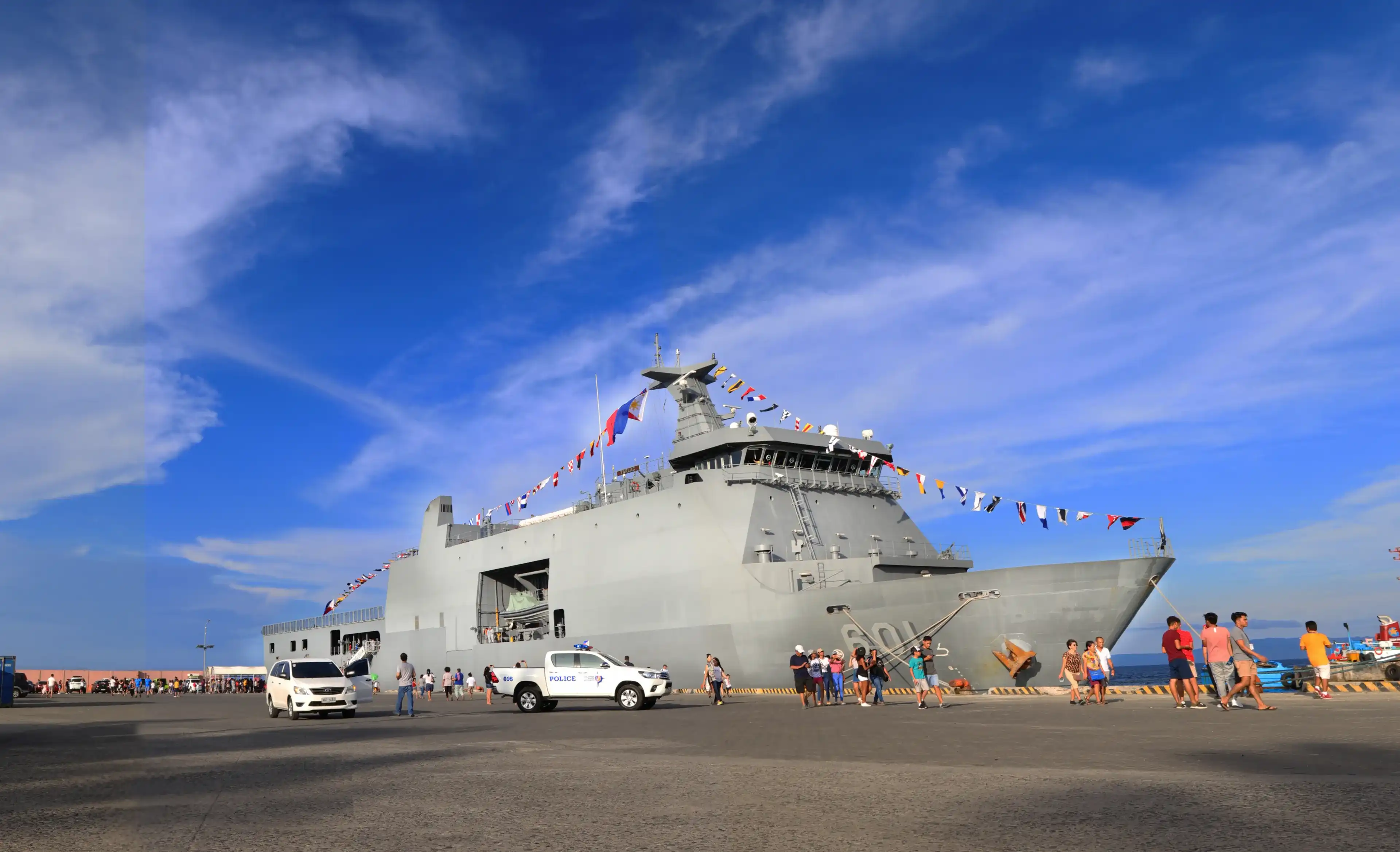 Seaport of Dumaguete City, Negros Oriental, Philippines - June 13, 2019: Indpenence Day: BRP Tarlac(LD-601), one of the strategic naval ships of the Philippines. Seaport of Dumaguete City, Negros Oriental, Philippines - June 13, 2019: Indpenence Day: BRP Tarlac(LD-601), one of the strategic naval ships of the Philippines.