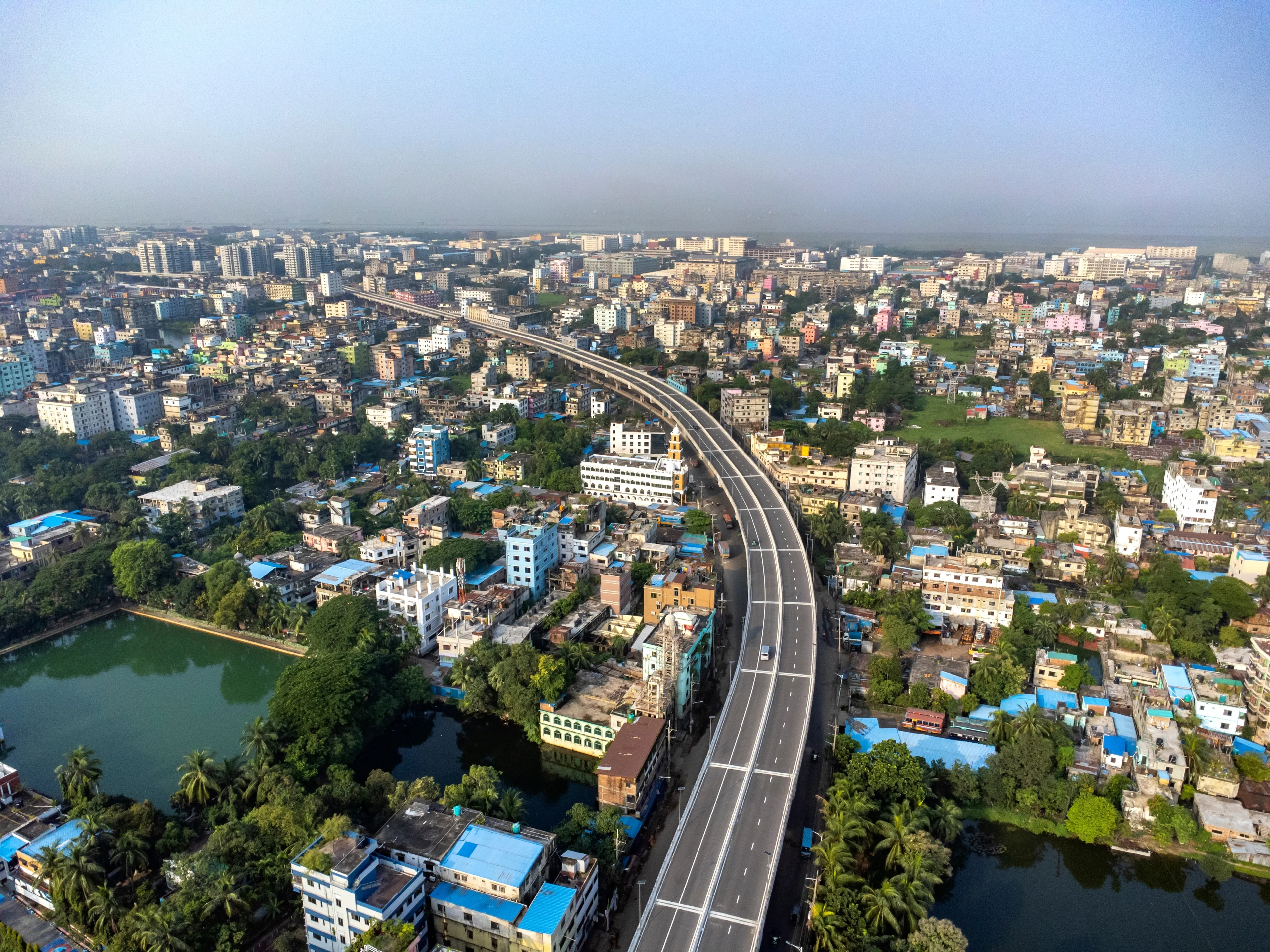 Elevated Expressway from Lalkhan Bazar to Sha-Amanat Airport in Chittagong, Bangladesh.  Chattogram's first elevated expressway with Chittagong City aerial view. Aerial View Cityscape of Chittagong 