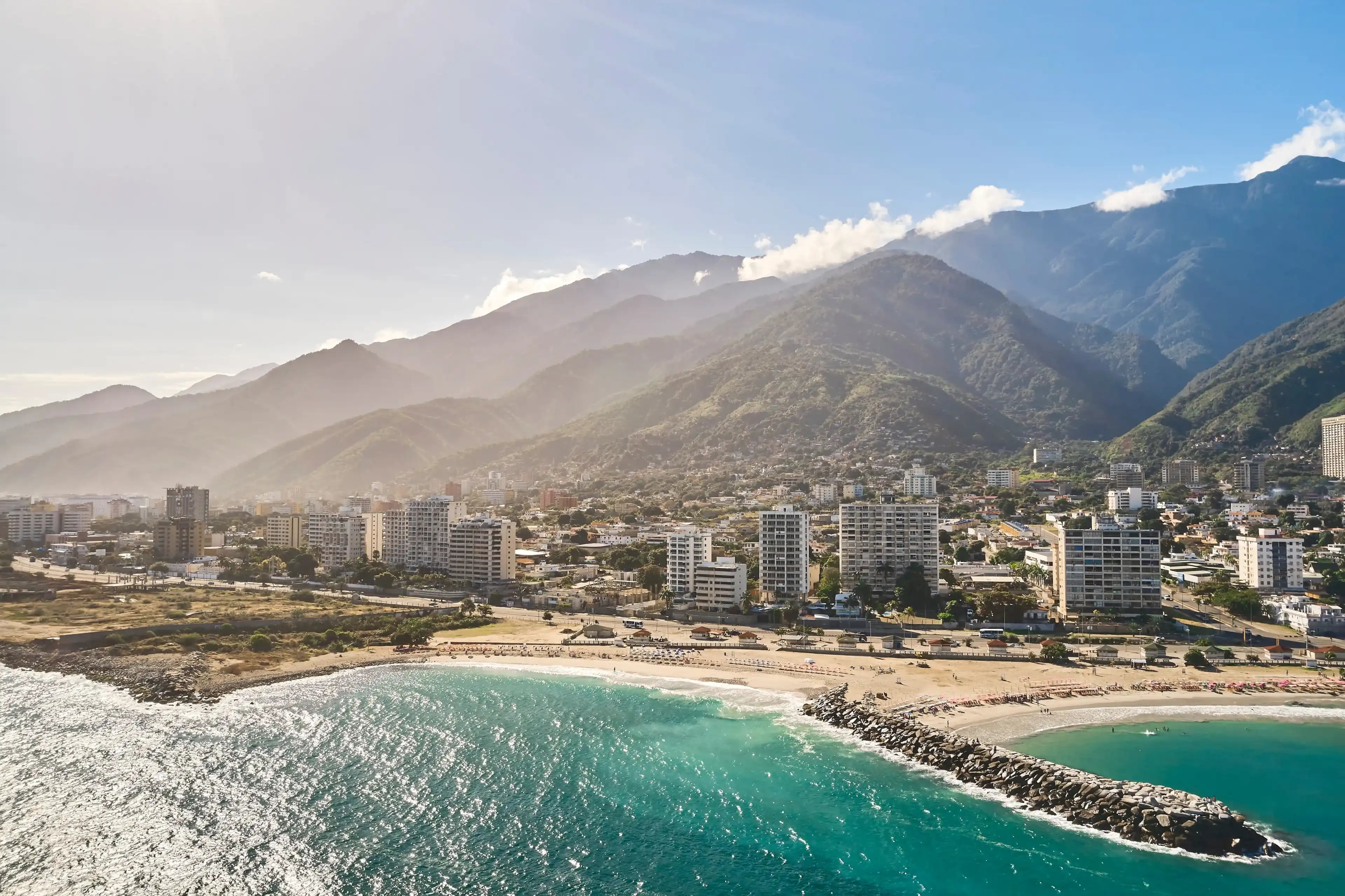 Aerial view picturesque public beach with turquoise water. Los Corales, La Guaira, Venezuela Aerial view picturesque public beach with turquoise water. Los Corales, La Guaira, Venezuela