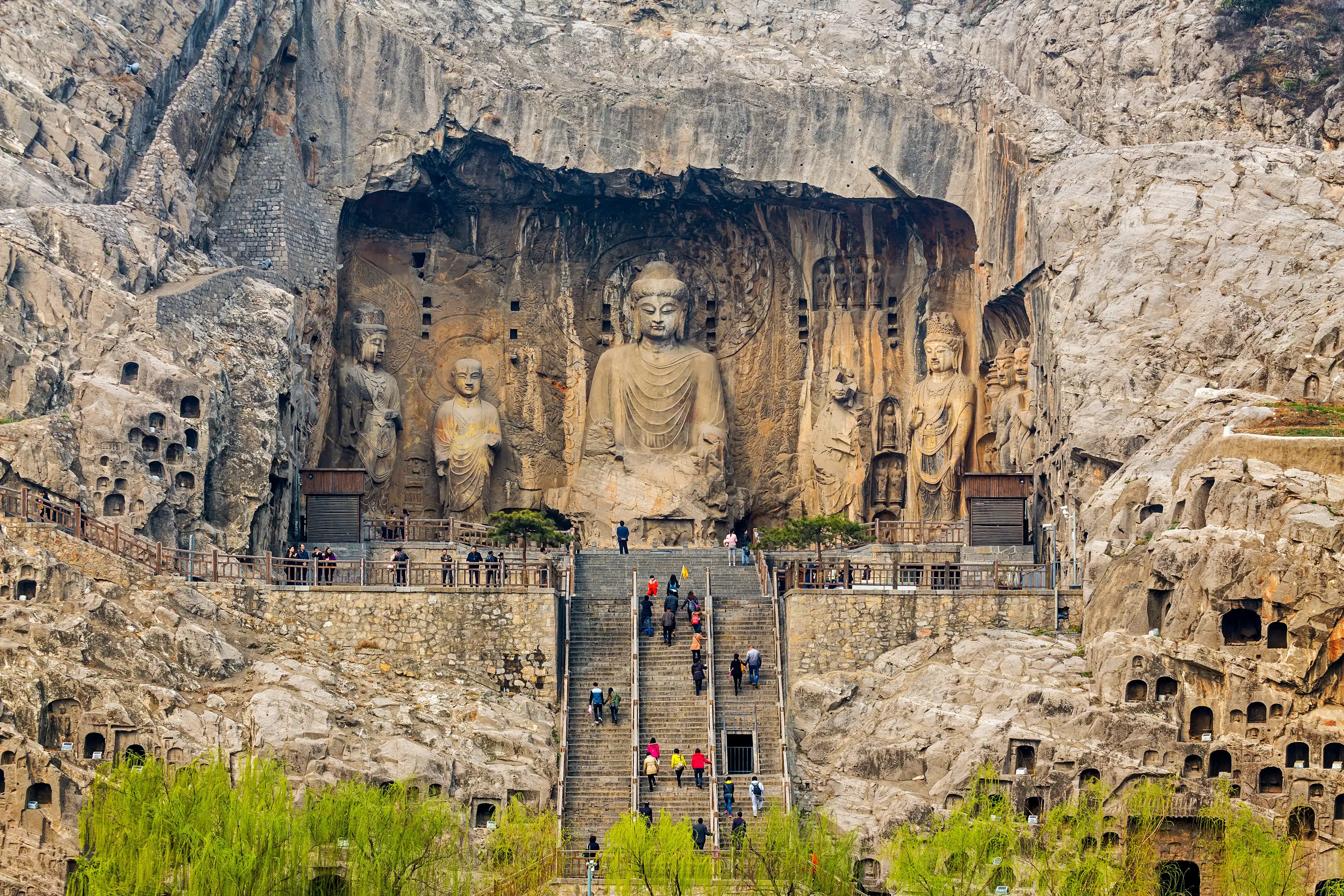 LUOYANG, CHINA -MAR 19: Visitors at Longmen grottoes on March 19, 2014.It is one of the four notable grottoes in Luoyang,Henan,China . A UNESCO World Heritage Site. 