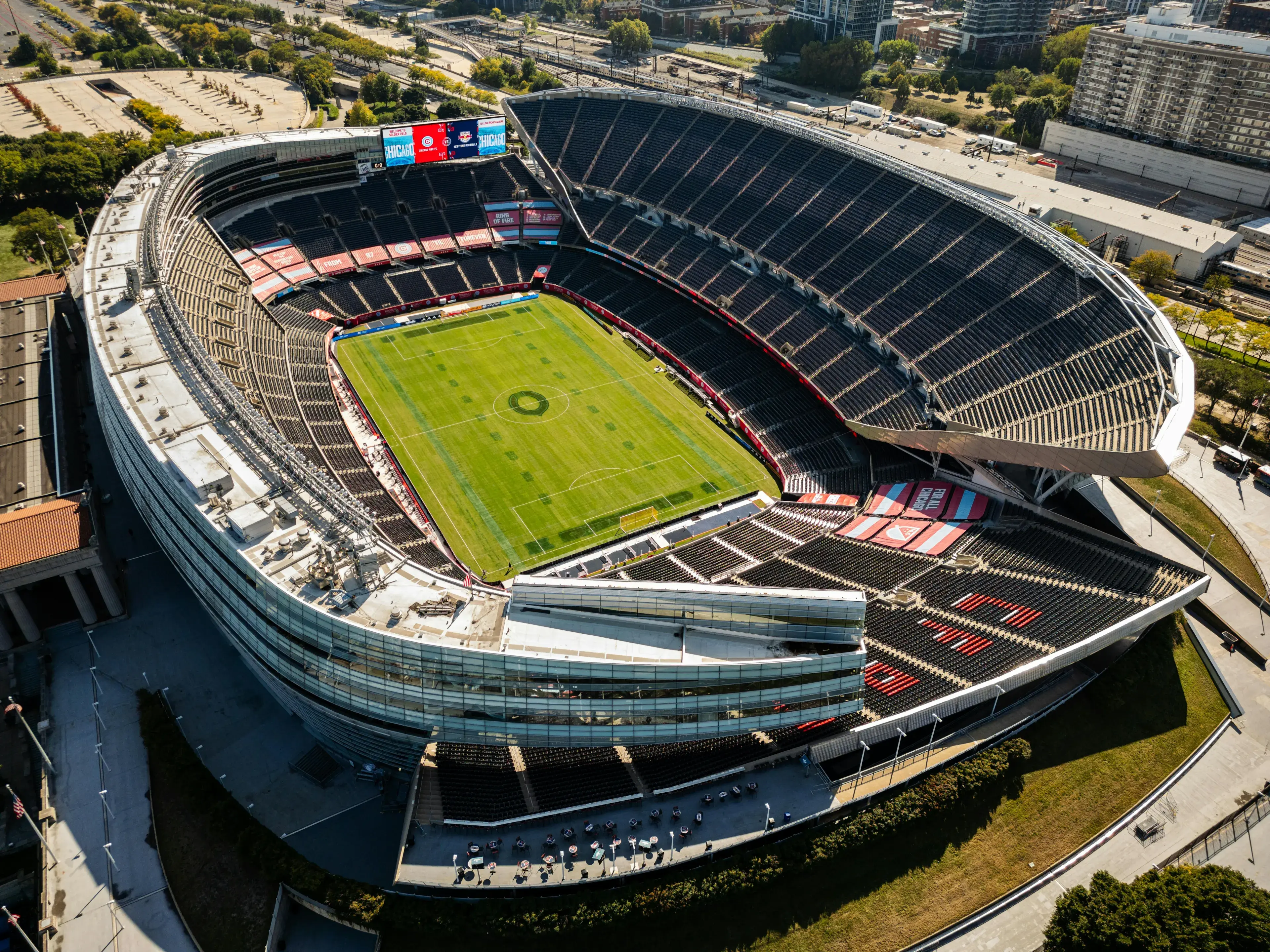 Aerial View of Modern Soccer Stadium in Urban Setting Aerial View of Modern Soccer Stadium in Urban Setting