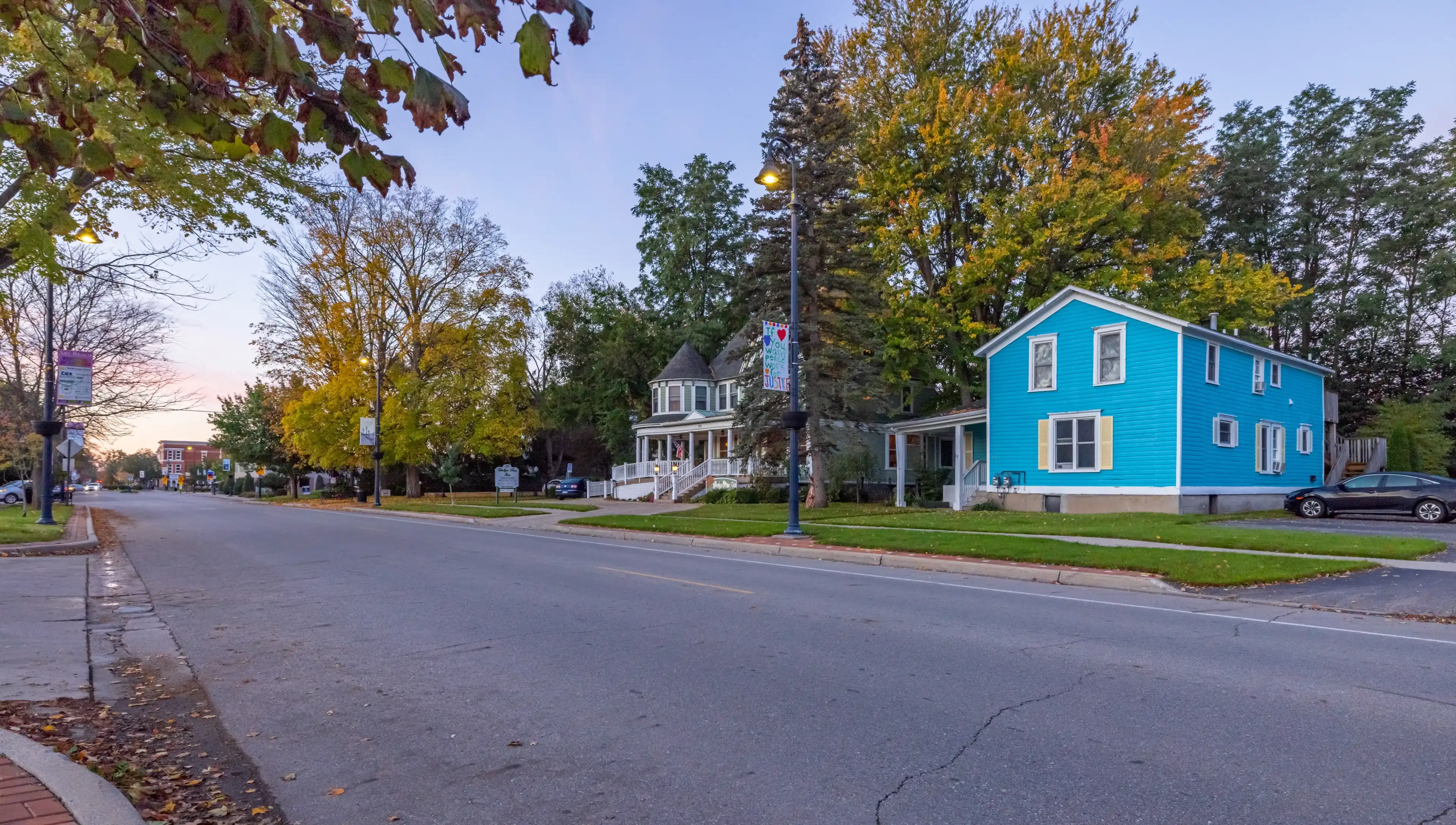Mount Pleasant, Michigan, USA - October 22, 2021: Residential area with antique House along Main Street Mount Pleasant, Michigan, USA - October 22, 2021: Residential area with antique House along Main Street