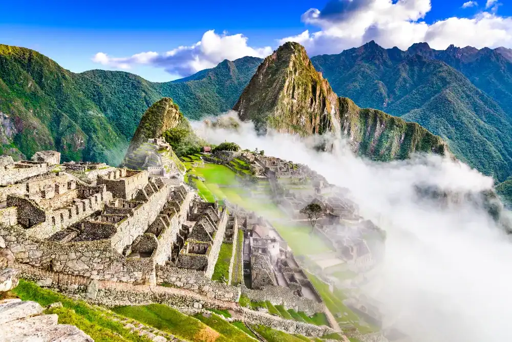 Machu Picchu, Peru - Ruins of Inca Empire city, in Cusco region, amazing place of South America. Machu Picchu, Peru - Ruins of Inca Empire city, in Cusco region, amazing place of South America.