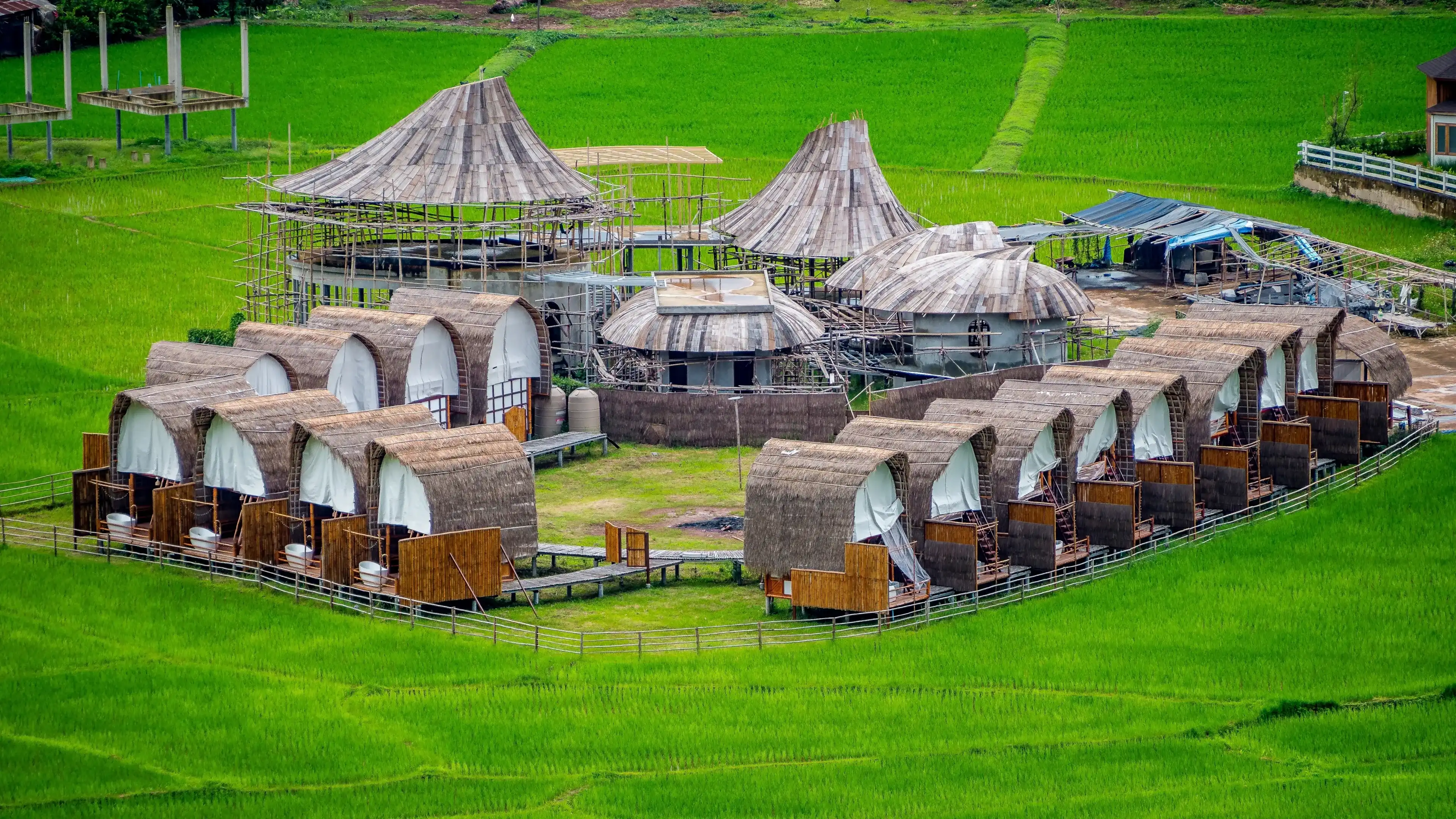 Nan, Thailand, Aug 5, 2023 - Sapan Village and rice filed with mountain surrounded Nan, Thailand, Aug 5, 2023 - Sapan Village and rice filed with mountain surrounded