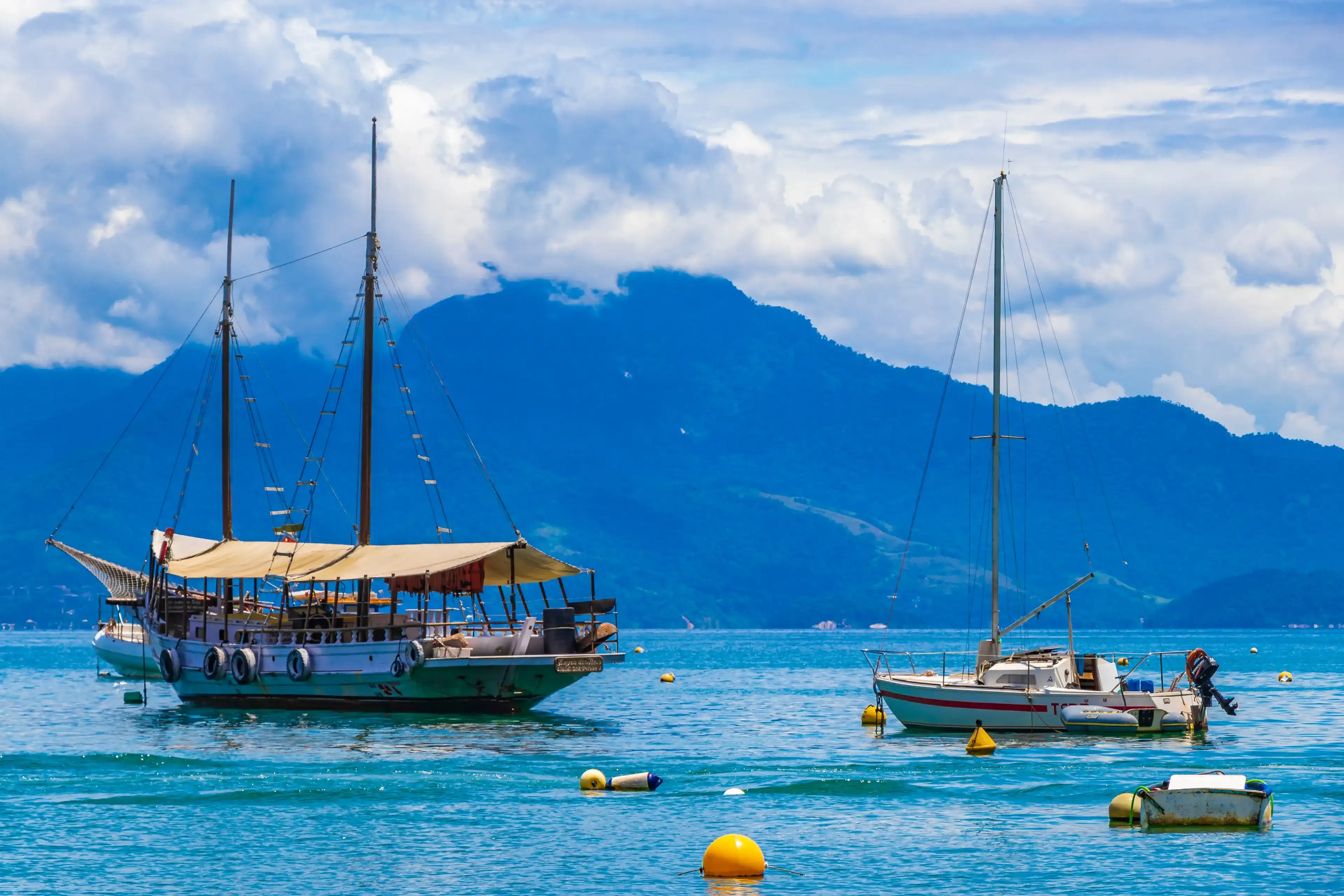 Ilha Grande 30. November 2020 Boats ships and Boat trips from Abraao beach Ilha Grande Angra dos Reis Rio de Janeiro Brazil. Ilha Grande 30. November 2020 Boats ships and Boat trips from Abraao beach Ilha Grande Angra dos Reis Rio de Janeiro Brazil.