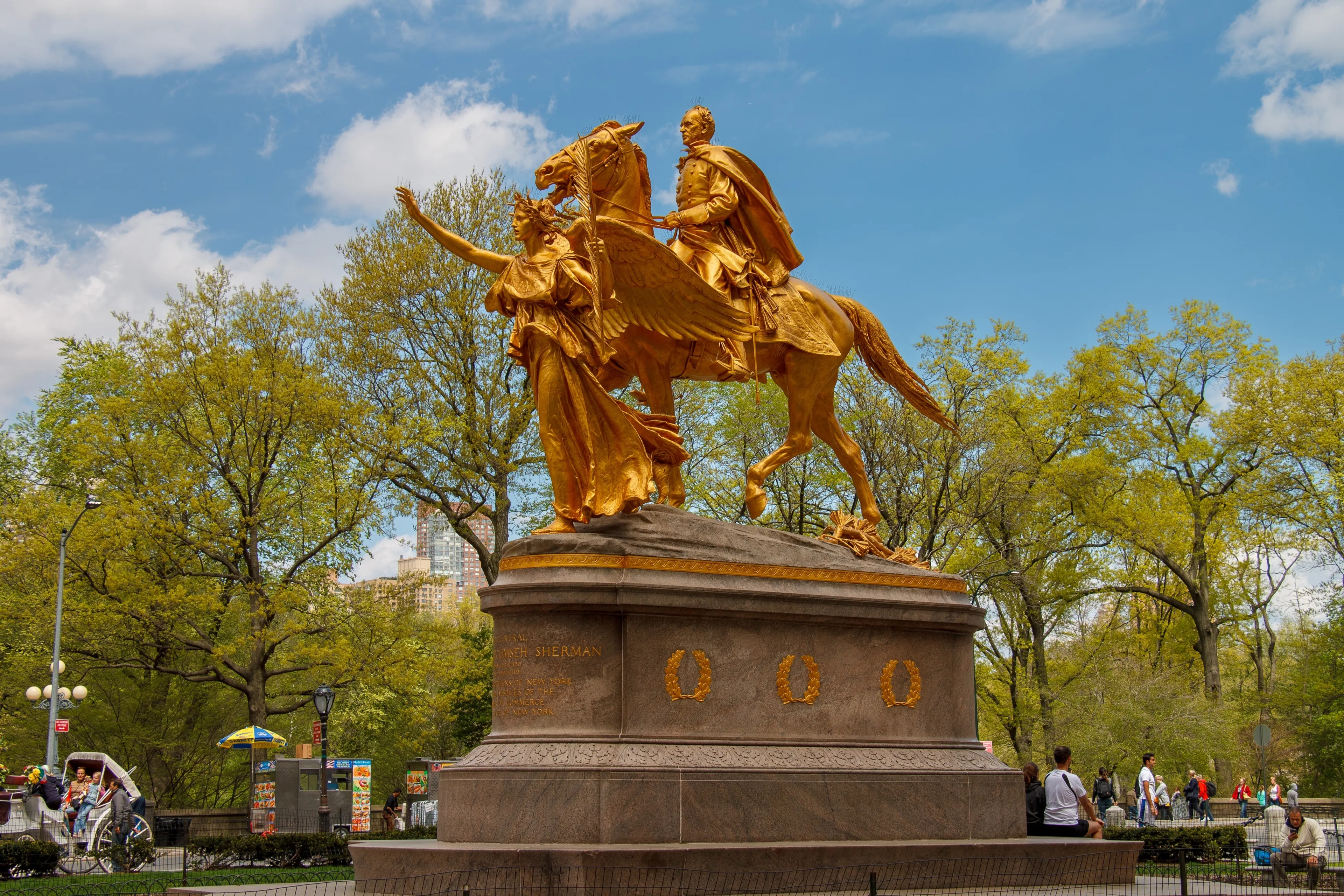 New York City, NY, USA - May, 5th, 2014. The golden monument of General William Tecumseh Sherman with a guiding female angel in Central Park, Manhattan, New York City