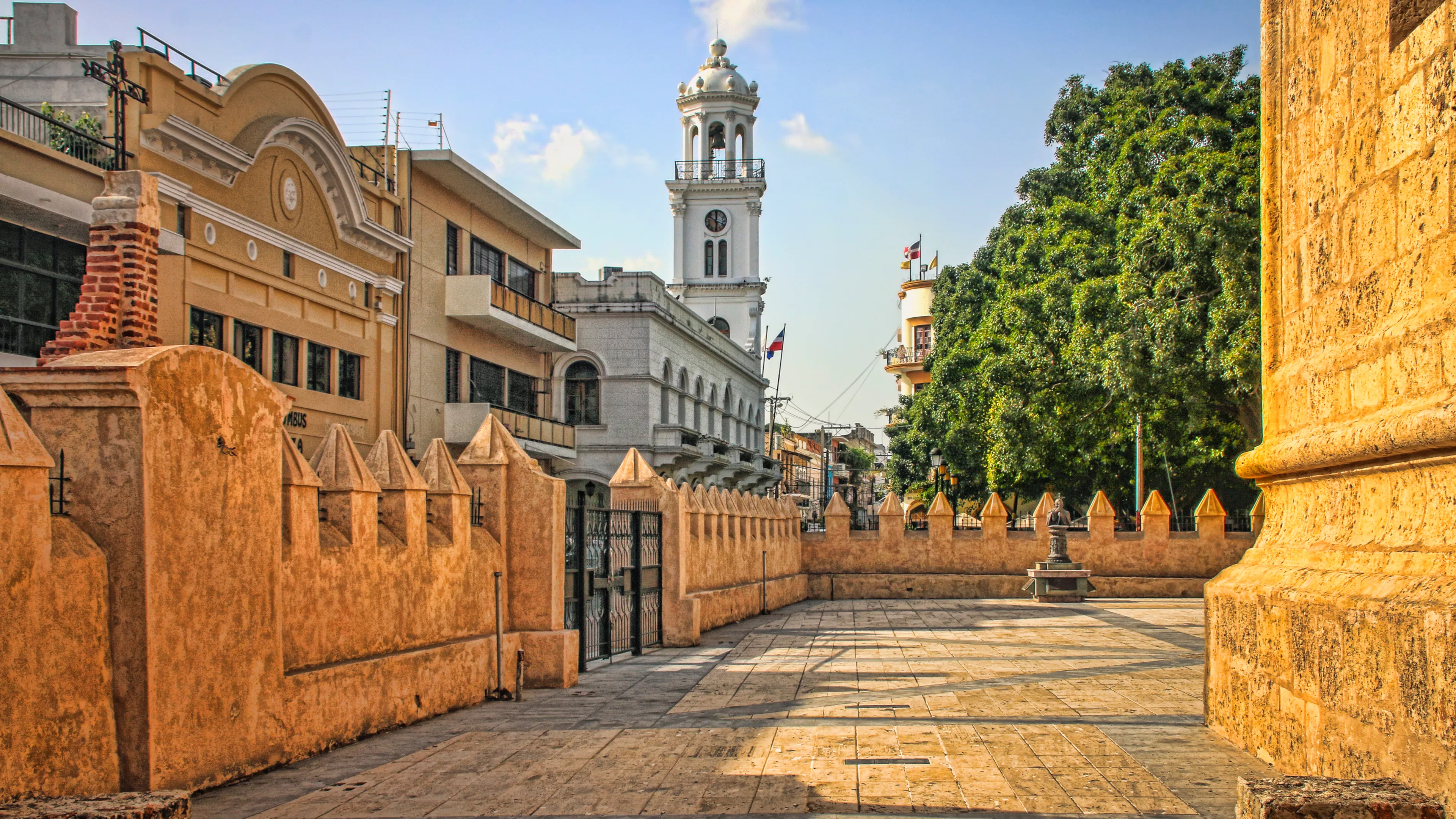 Historic City Center Plaza with Skyline of Colonial Buildings and Church (Santo Domingo, Dominican Republic).