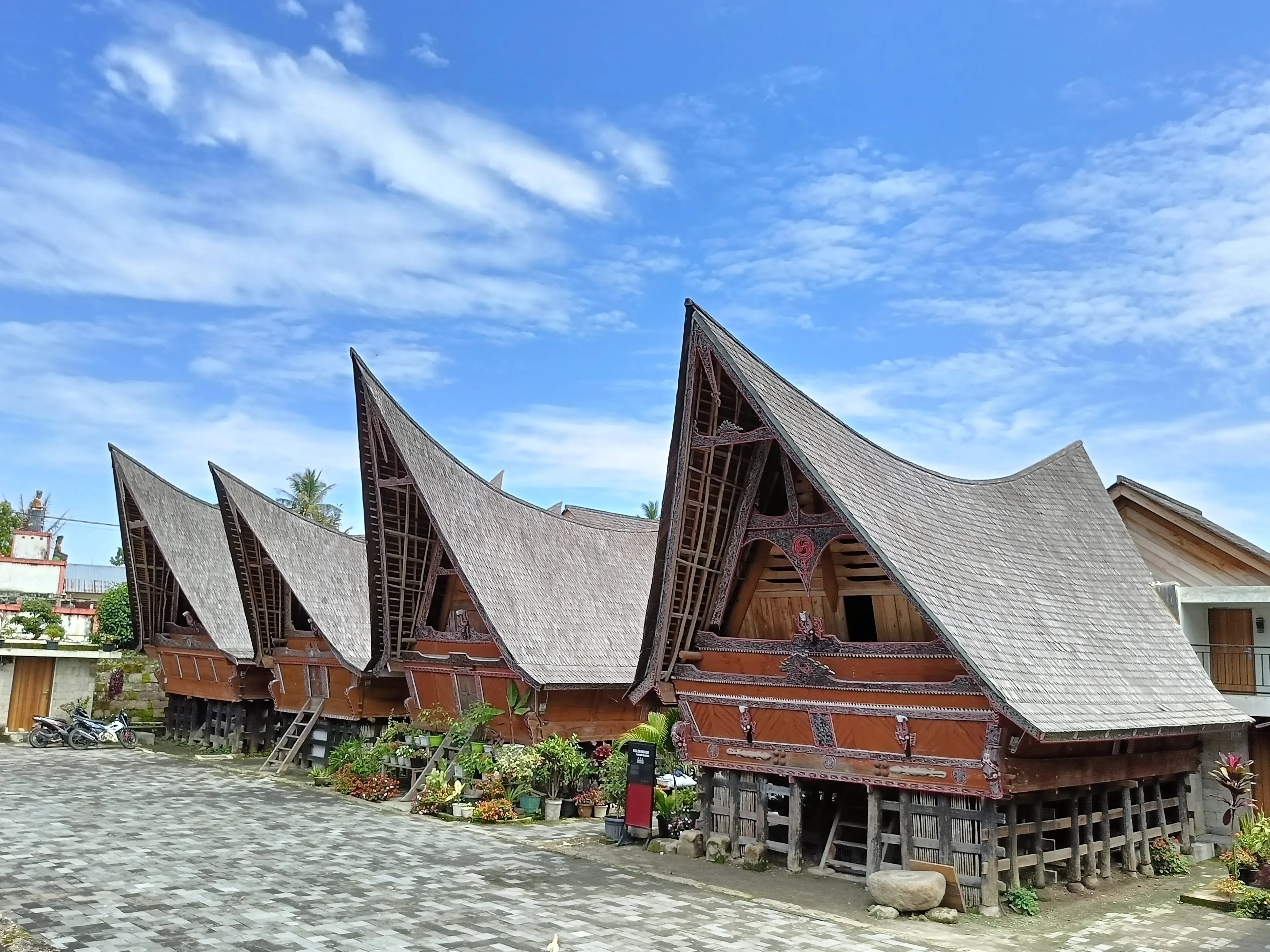 Batak House. Batak Tribe has many interesting things for visitors. For instance, it is the Batak House. The other name is Bolon House. Originally, it belongs to Batak Toba Tribe.