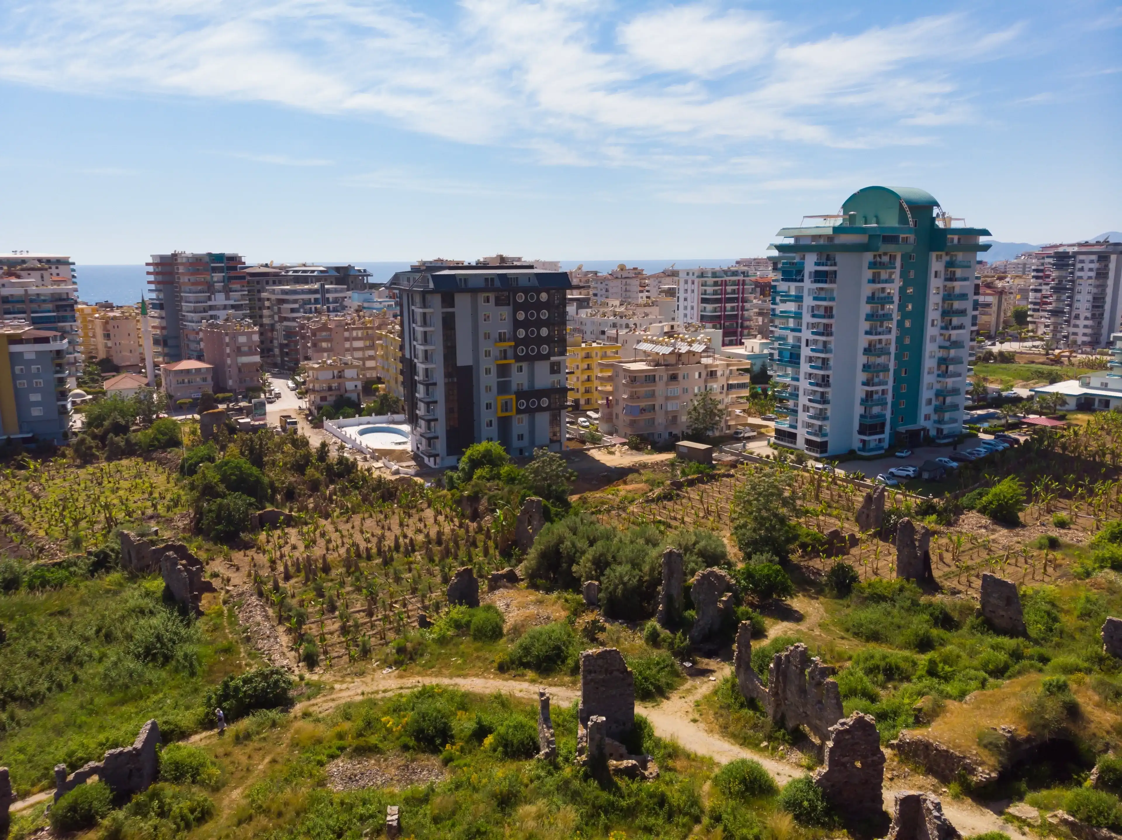 Aerial view of remains of Naula Ancient City located in center of Mahmutlar, district of Alanya, Turkey. Aerial view of remains of Naula Ancient City located in center of Mahmutlar, district of Alanya, Turkey.