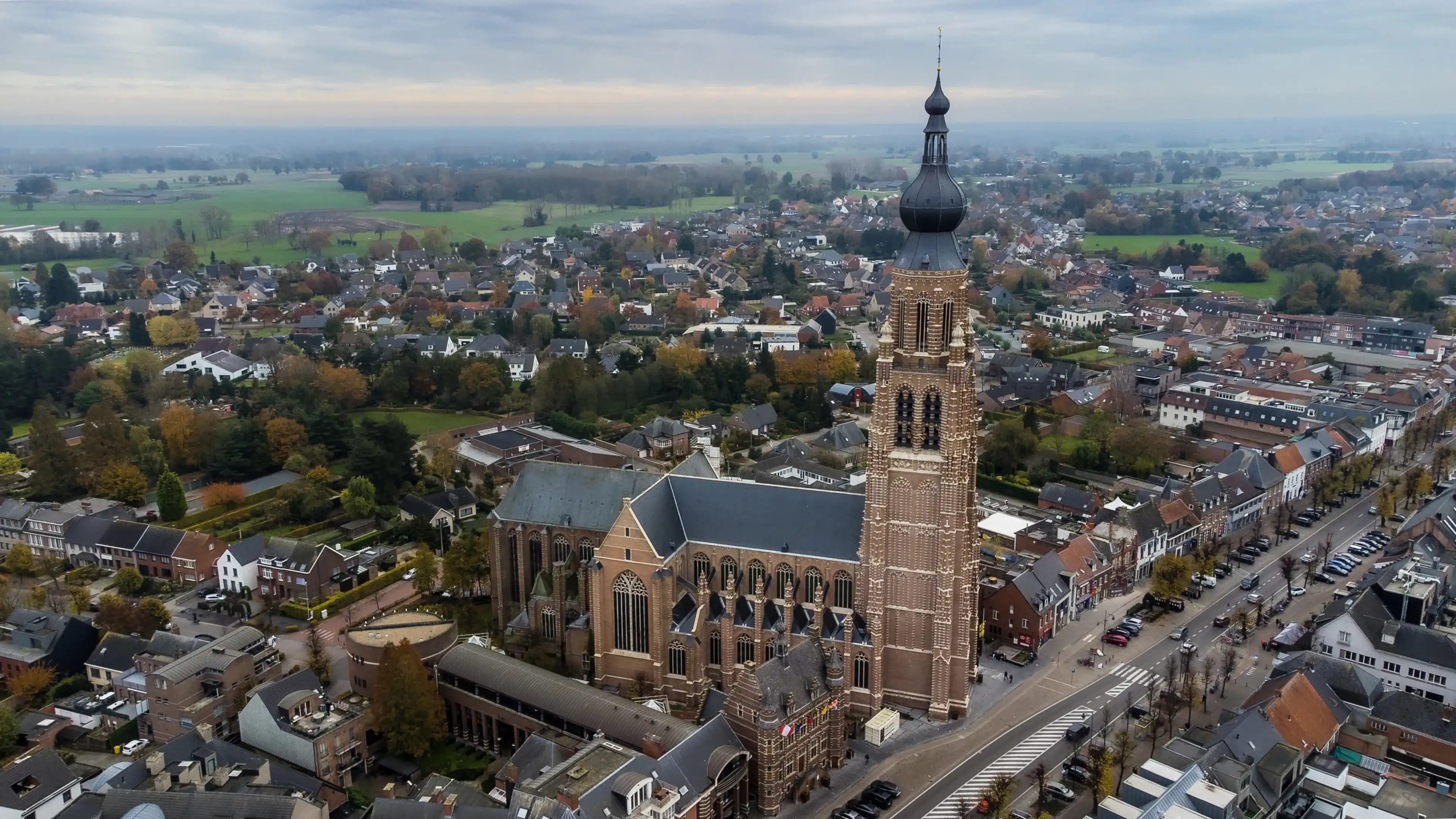 Belgium, Hoogstraten, 11 november 2021, Aerial drone photo of the late Gothic Saint-Katharina church, the third highest Belgium church, one of the world's tallest brick buildings. High quality photo