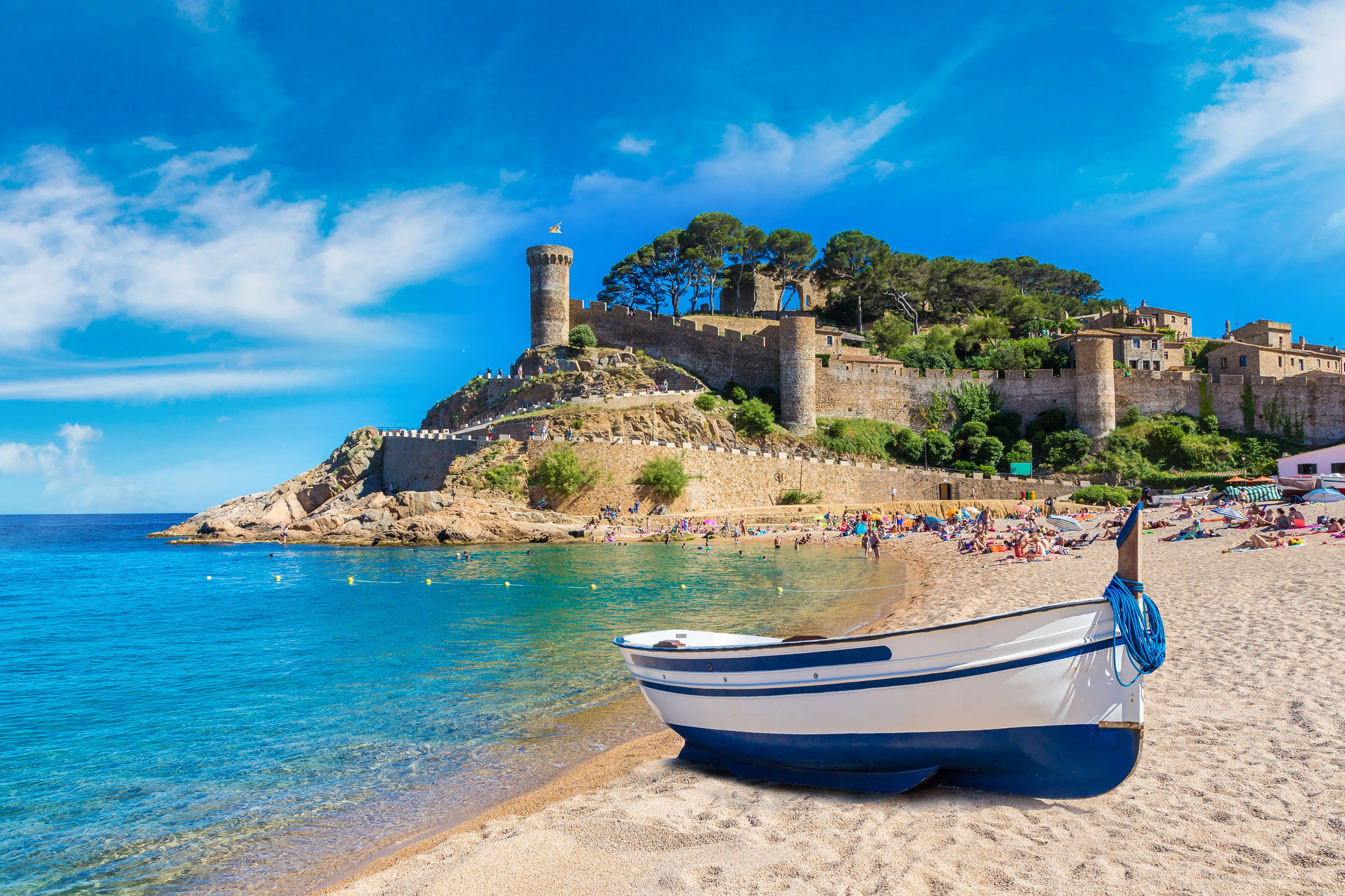 Beach at Tossa de Mar and fortress in a beautiful summer day, Costa Brava, Catalonia, Spain