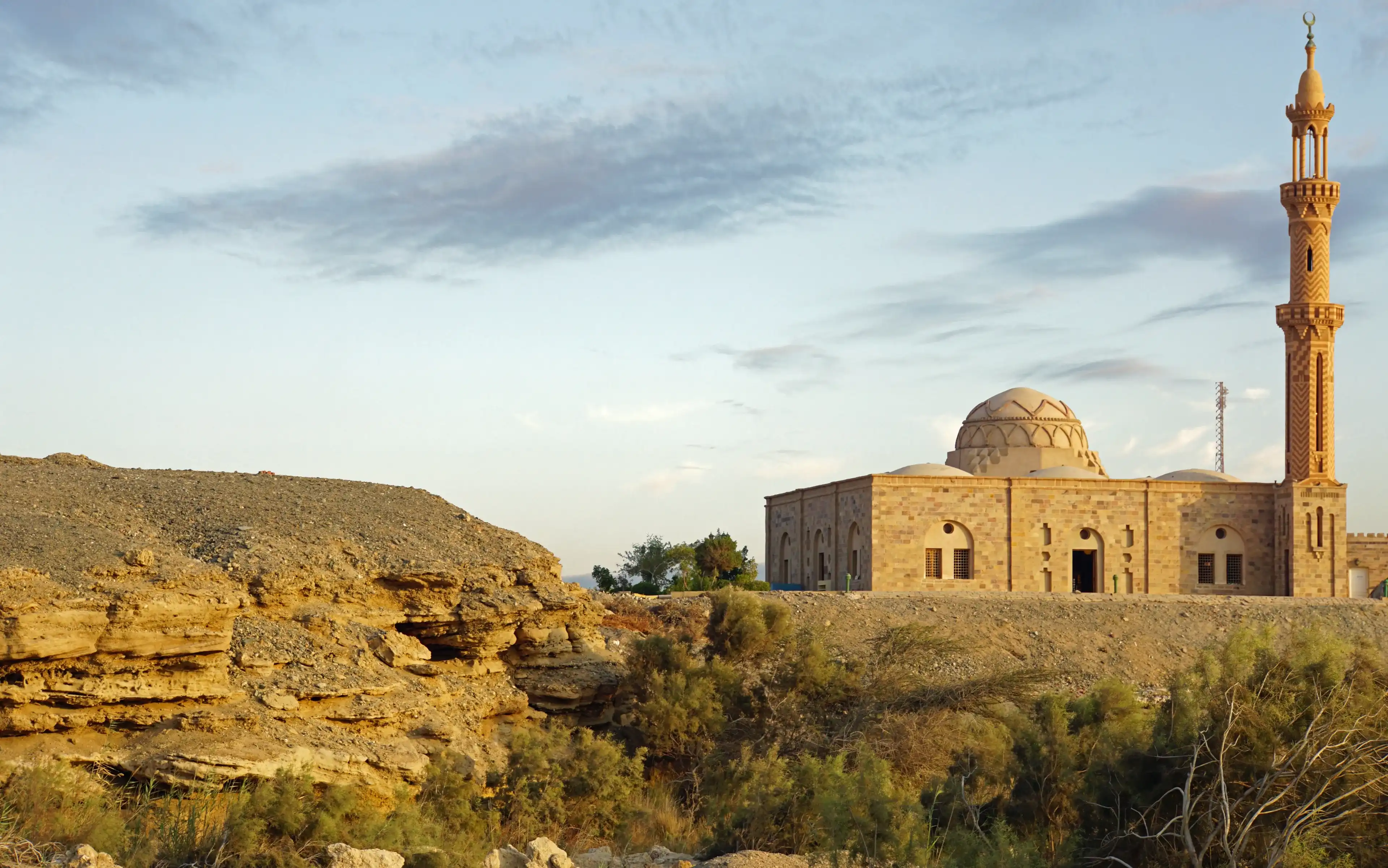 sunset over mosque in egypt town of Al-Qusayr, Egypt sunset over mosque in egypt town of Al-Qusayr, Egypt