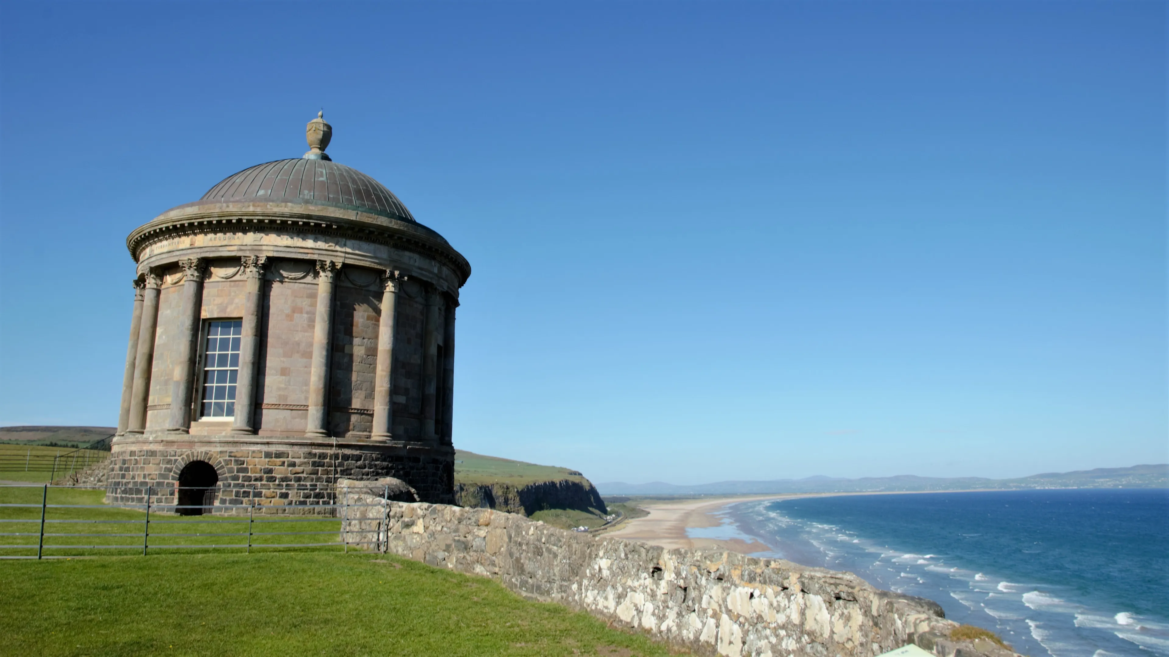 Mussenden Temple is located at a cliff overlooking Downhill Strand in the beautiful surroundings of Downhill Demesne near Castlerock in County Londonderry, Northern Ireland, UK