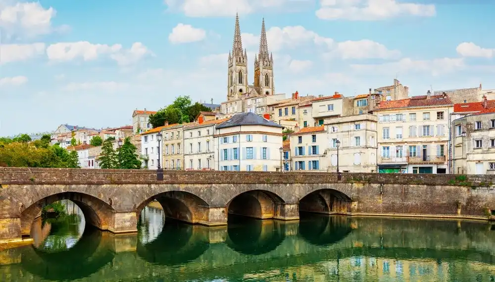 A view of Niort from the quay of Sevre Niortaise river, Deux-Sevres, Poitou-Charentes region, France 