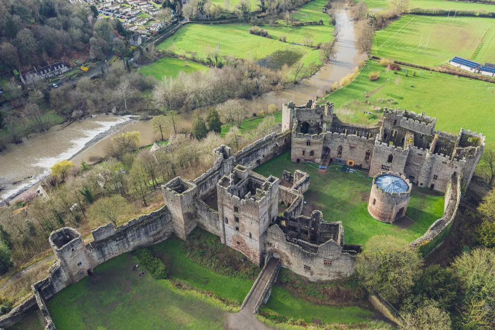 Top down aerial view over ruins of medieval fortification - Ludlow Castle in Shropshire, UK