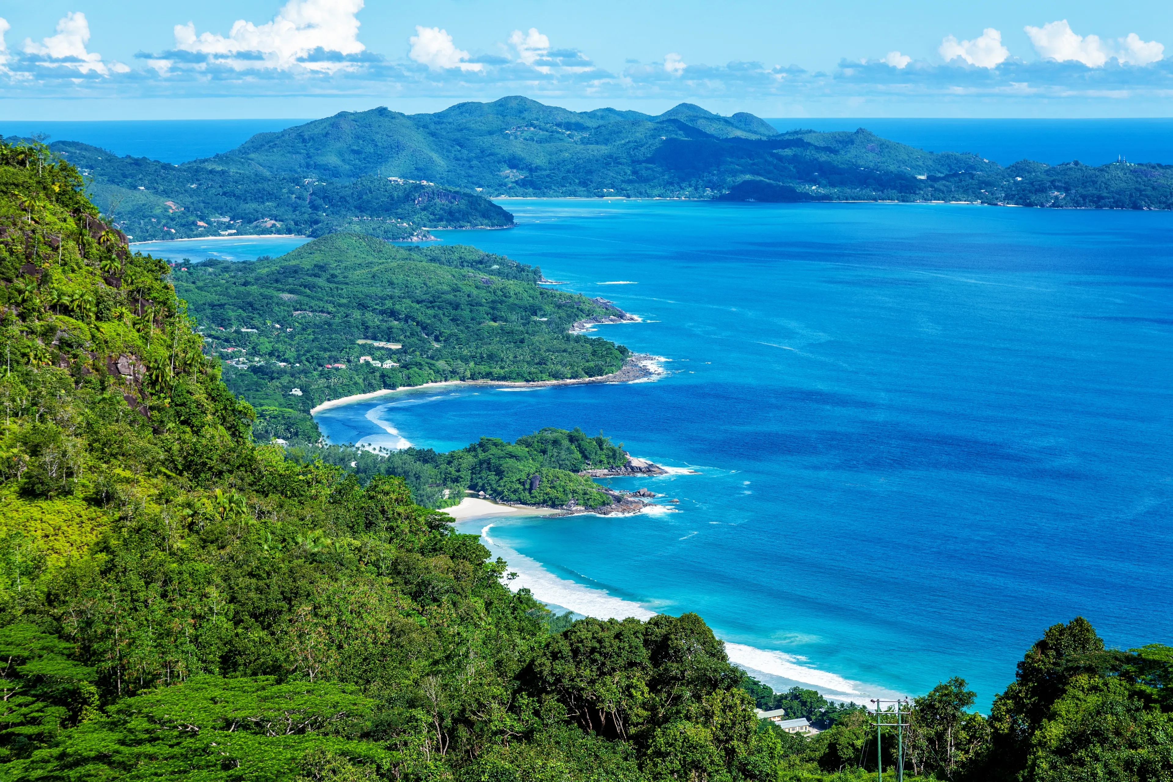 West coast of the Island Mahé, Republic of Seychelles, Africa. Bay Grand Anse in the foreground, Bay Anse Boileau and Bay Anse a la Mouche in the background. View from Venn's Town - Mission Lodge.