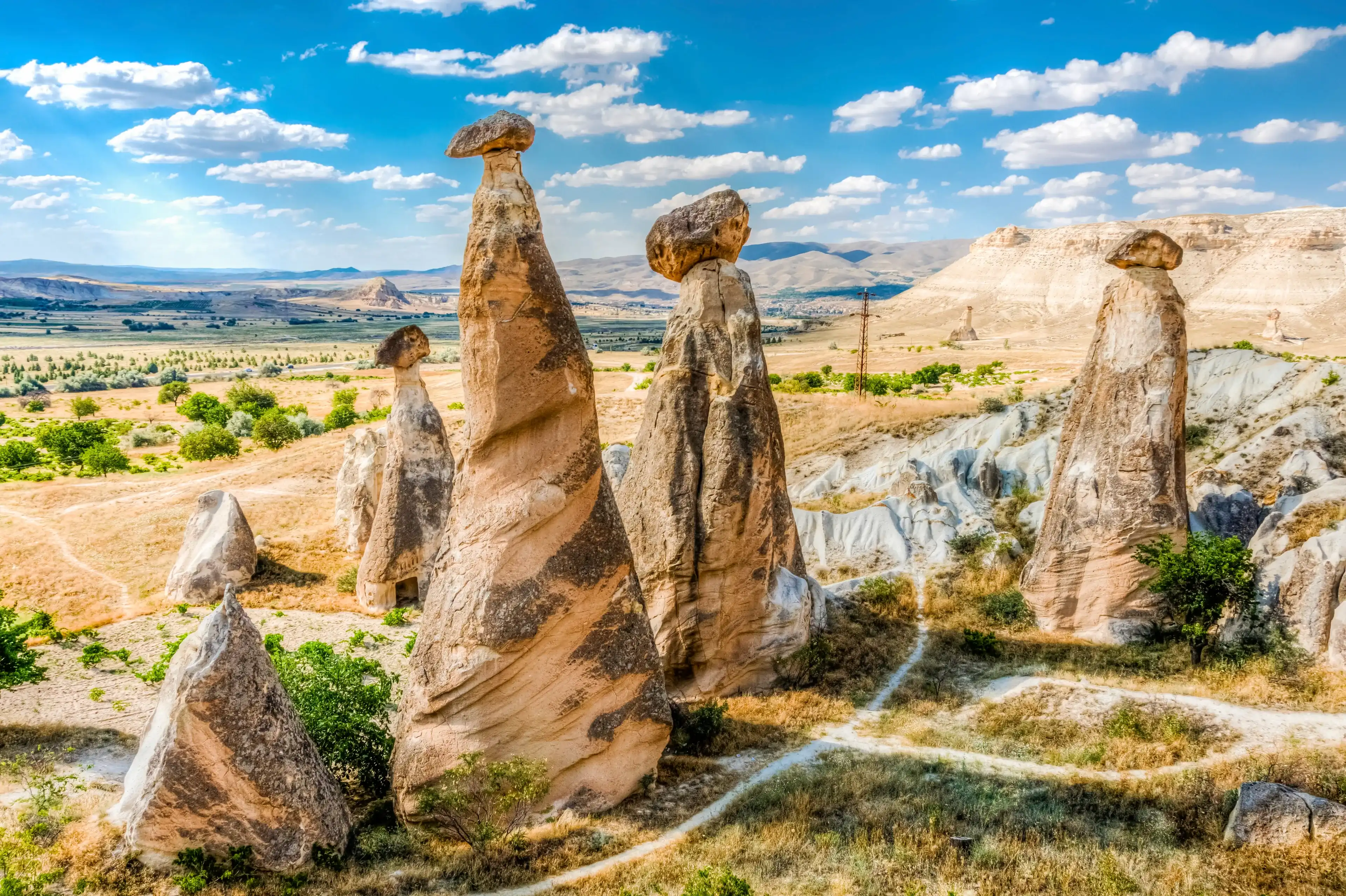 Fairy chimneys view near Cavusin Town in Cappadocia Fairy chimneys view near Cavusin Town in Cappadocia