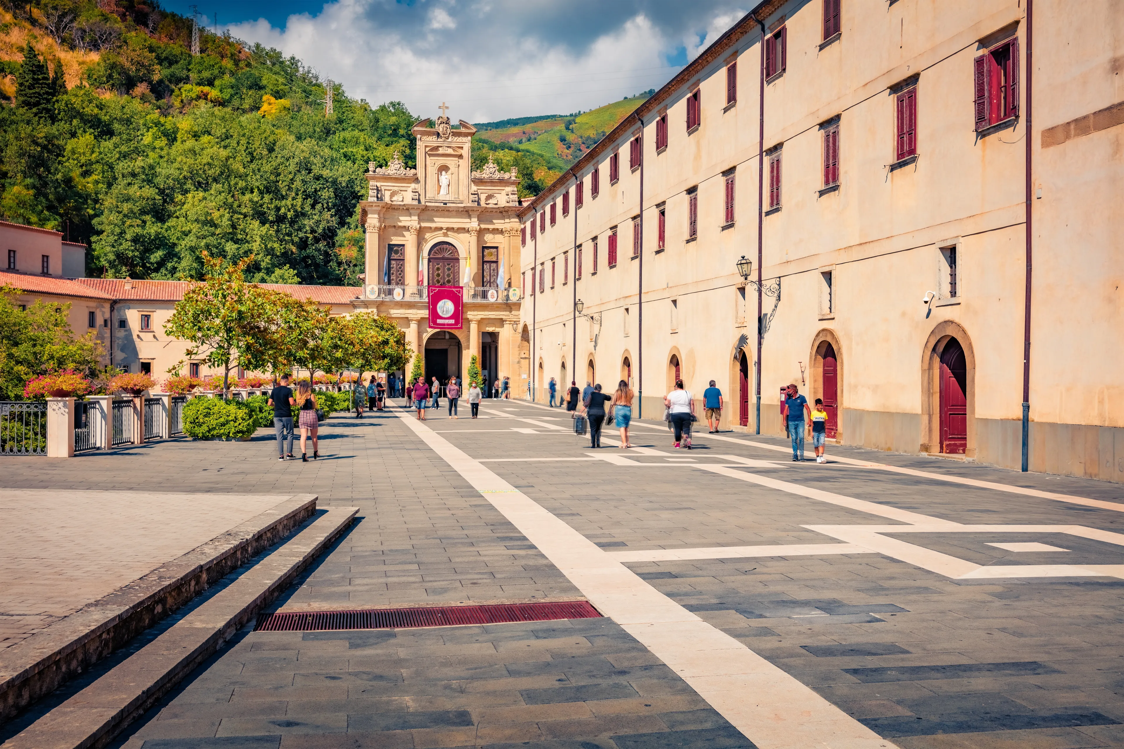 PAOLA, ITALY - AUGUST 29, 2021: Bright afternoon view of Sanctuary of Saint Francis of Paola. Splendid summer cityscape of Paola town, Province of Cosenza, Italy, Europe.