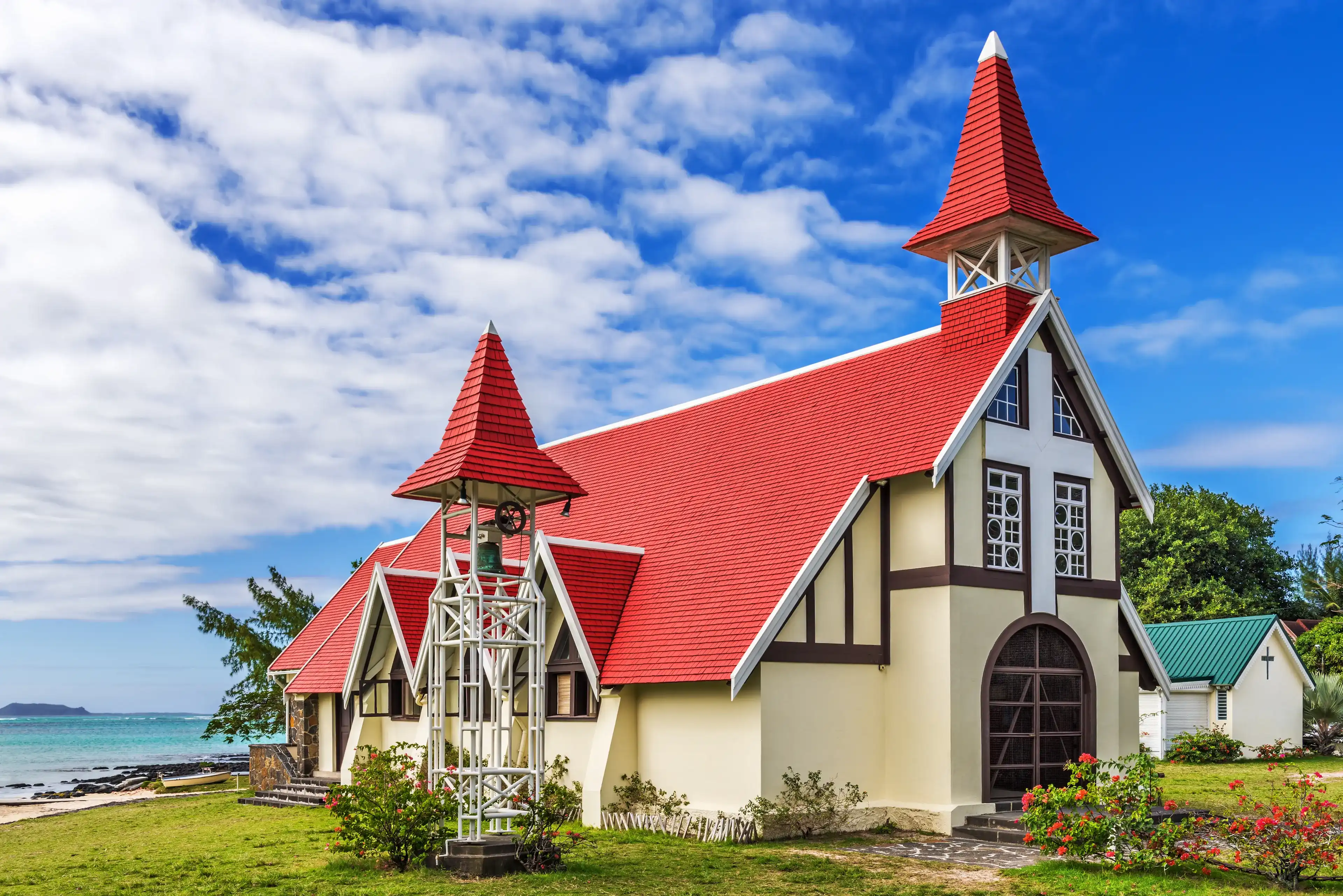 Notre Dame Auxiliatrice Church with distinctive red roof at Cap Malheureux, Mauritius, Indian Ocean Notre Dame Auxiliatrice Church with distinctive red roof at Cap Malheureux, Mauritius, Indian Ocean