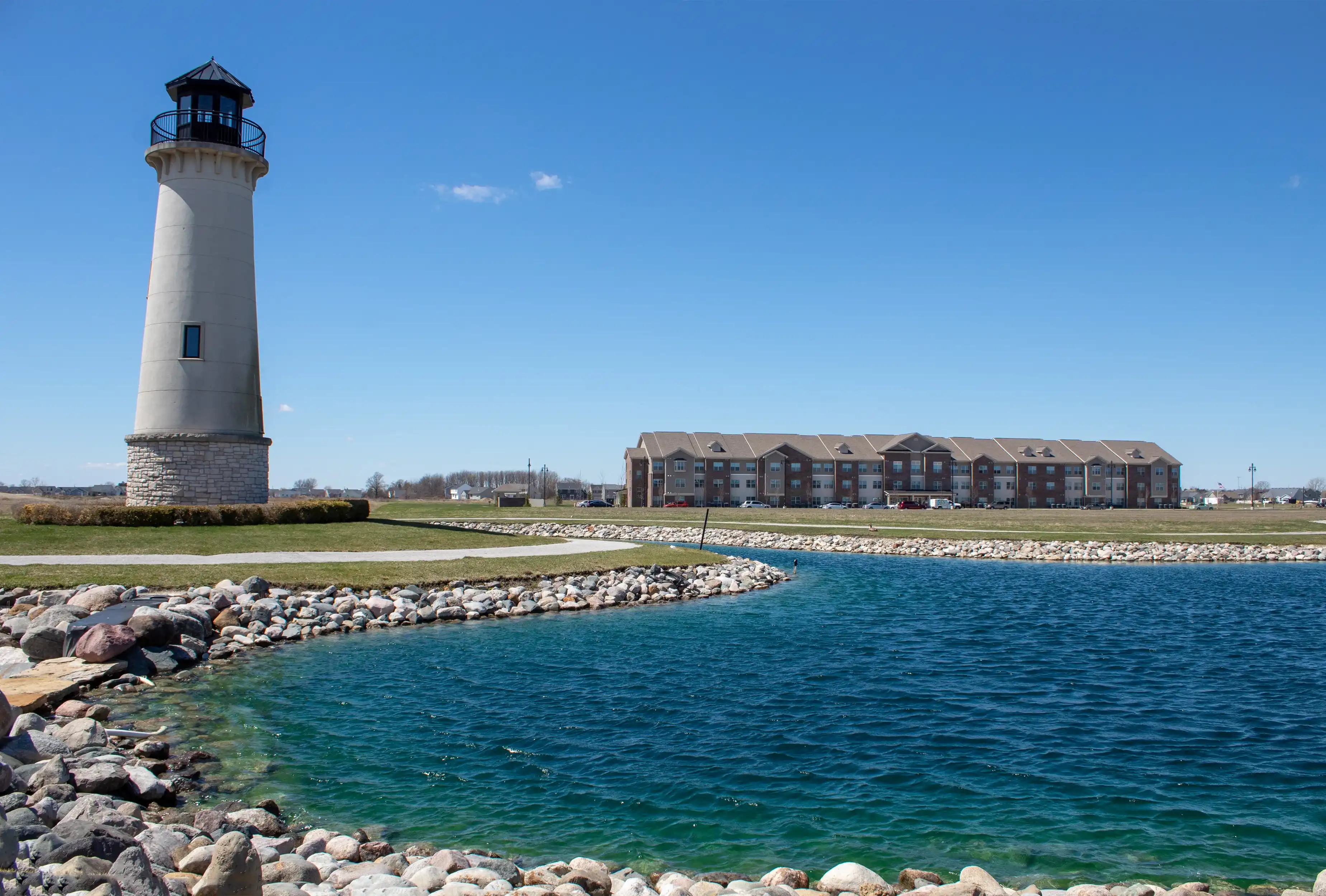 Perrysburg, OH / USA - April 15, 2019: View of the lighthouse and Harbor Town Senior Residence in Perrysburg, Ohio.