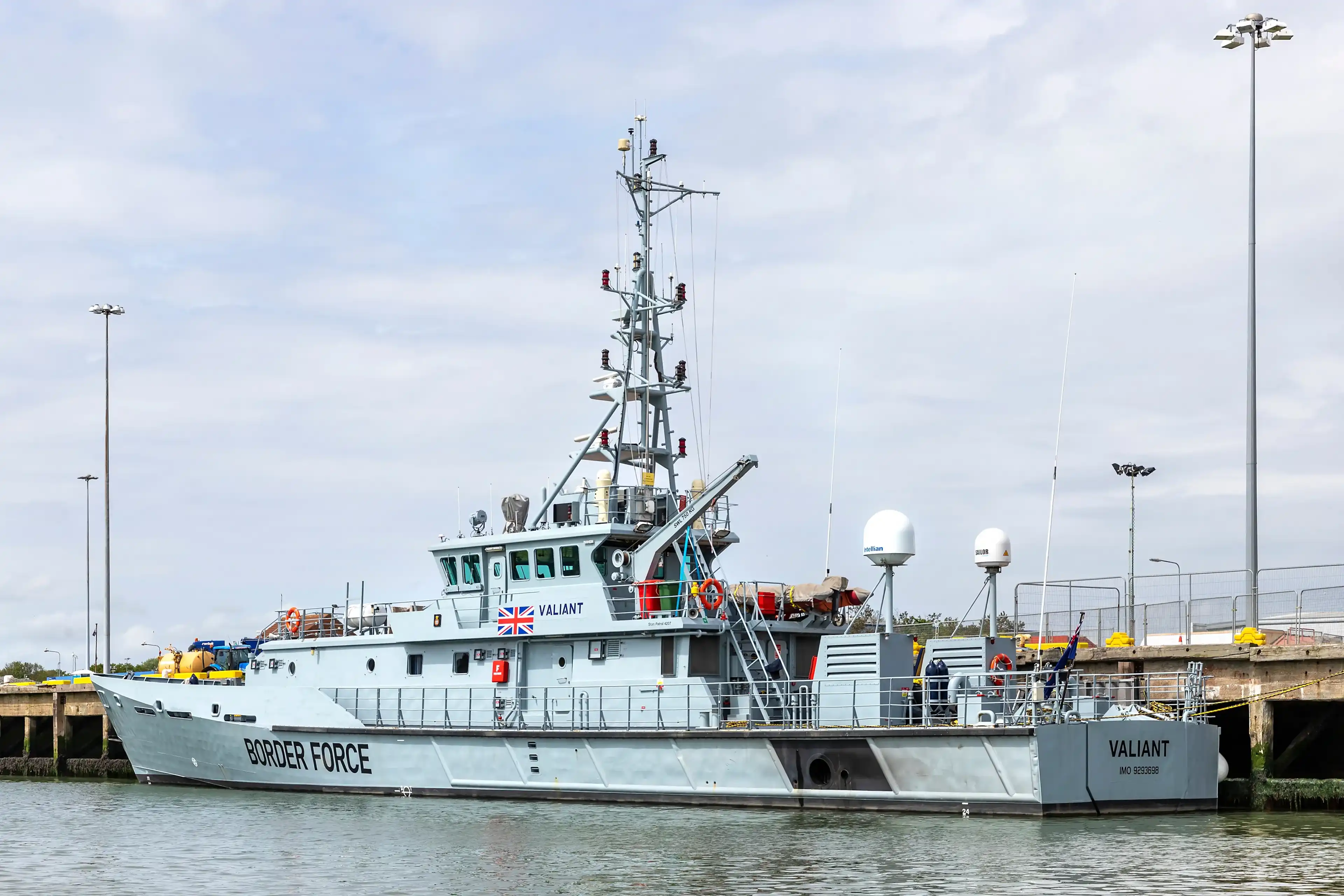 LOWESTOFT, SUFFOLK, UK – MAY 17, 2023: HMC Valiant, a Border Force (Customs) cutter of the United Kingdom, built by Damen Shipyards in the Netherlands in 2003, berthed in Lowestoft inner harbour. LOWESTOFT, SUFFOLK, UK – MAY 17, 2023: HMC Valiant, a Border Force (Customs) cutter of the United Kingdom, built by Damen Shipyards in the Netherlands in 2003, berthed in Lowestoft inner harbour.