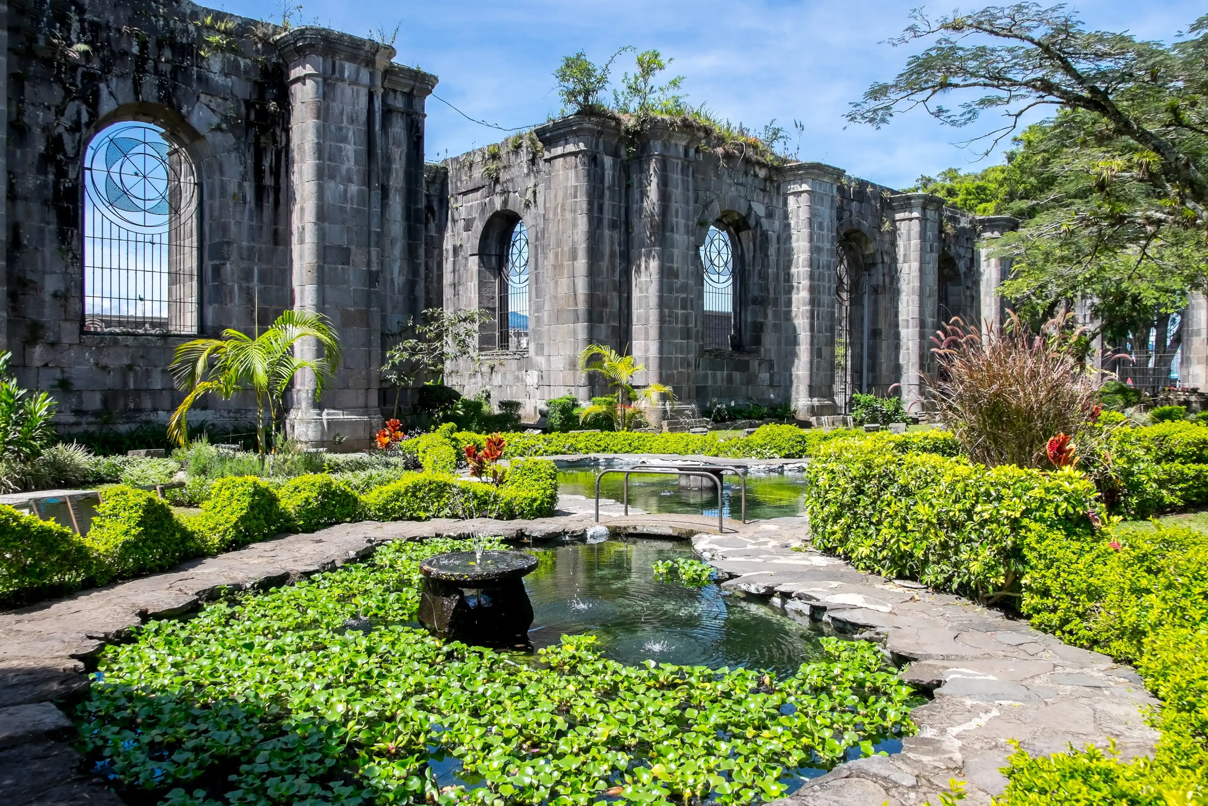 Cartago, Costa Rica - September 16, 2022: Gardens and ruins of a Romanesque church in the urban center of the city