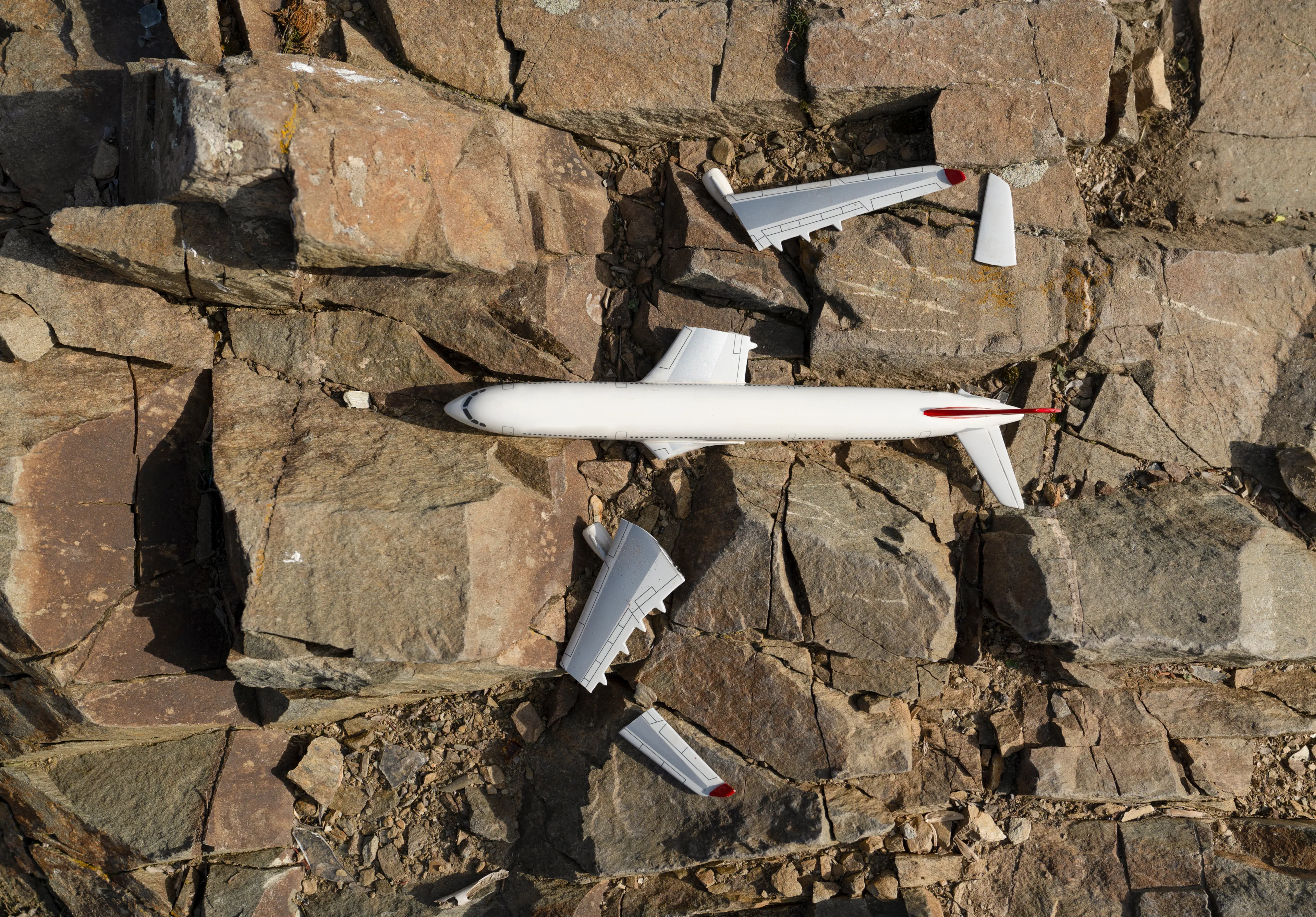 Concept of wreckage of a passenger plane on mountain