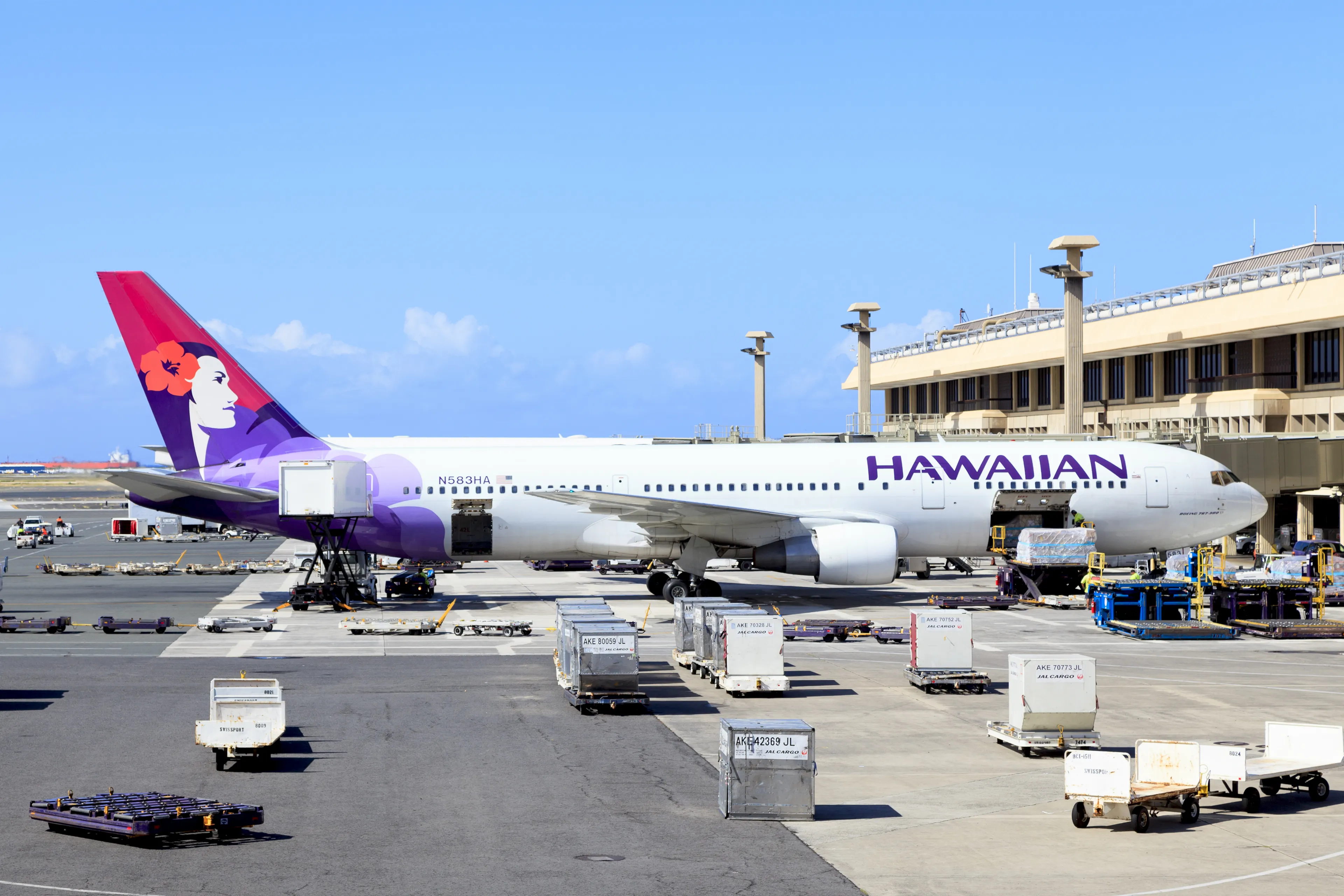 Honolulu, HI, USA - June 1, 2017: Airplane of Hawaiian Airlines: Airplane of Hawaiian Airlines stops in Daniel K. Inouye International Airport.