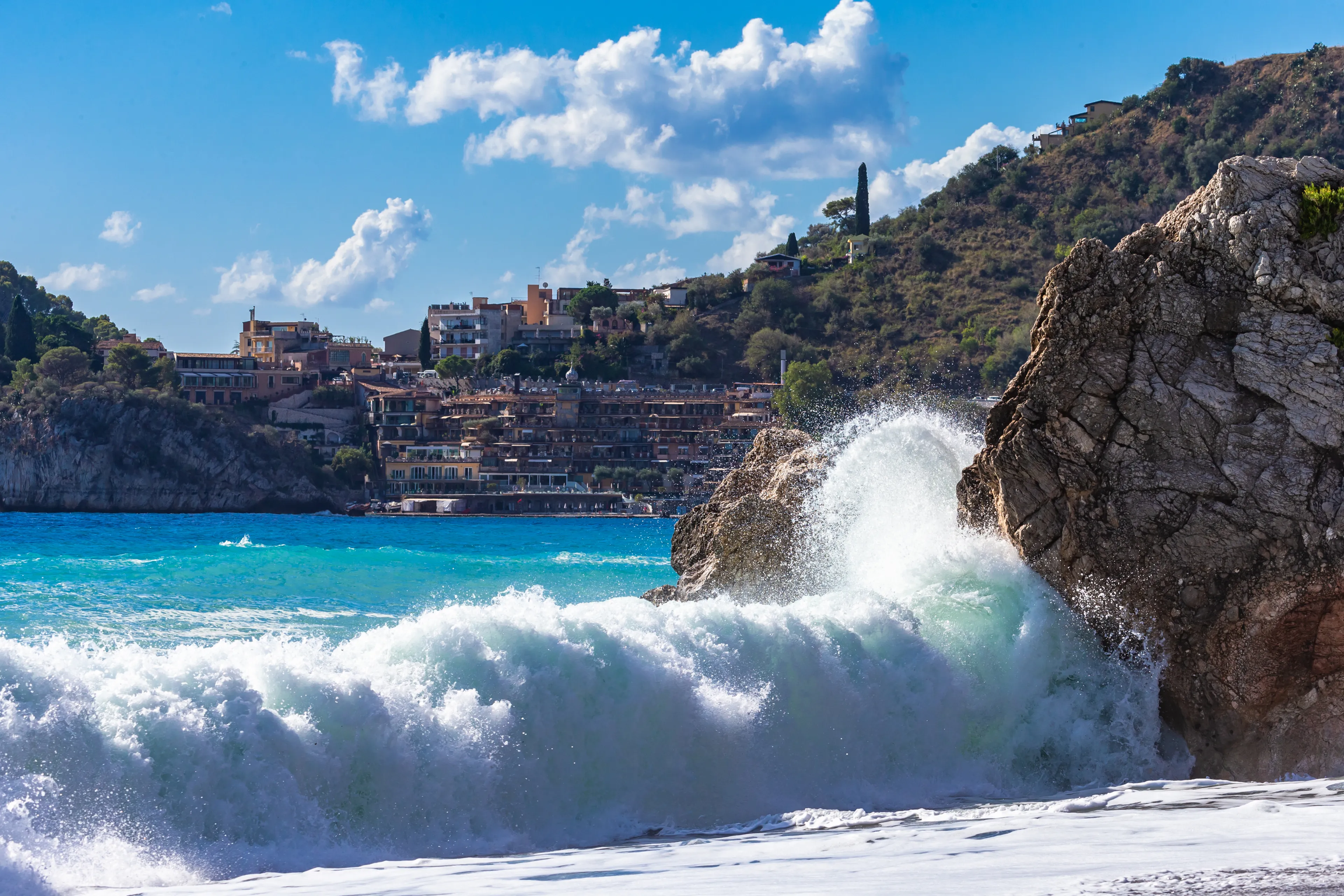 View from Letojanni to Taormina. Letojanni nestled to the north of Taormina, Letojanni is a popular coastal resort. Sicily, Italy.
