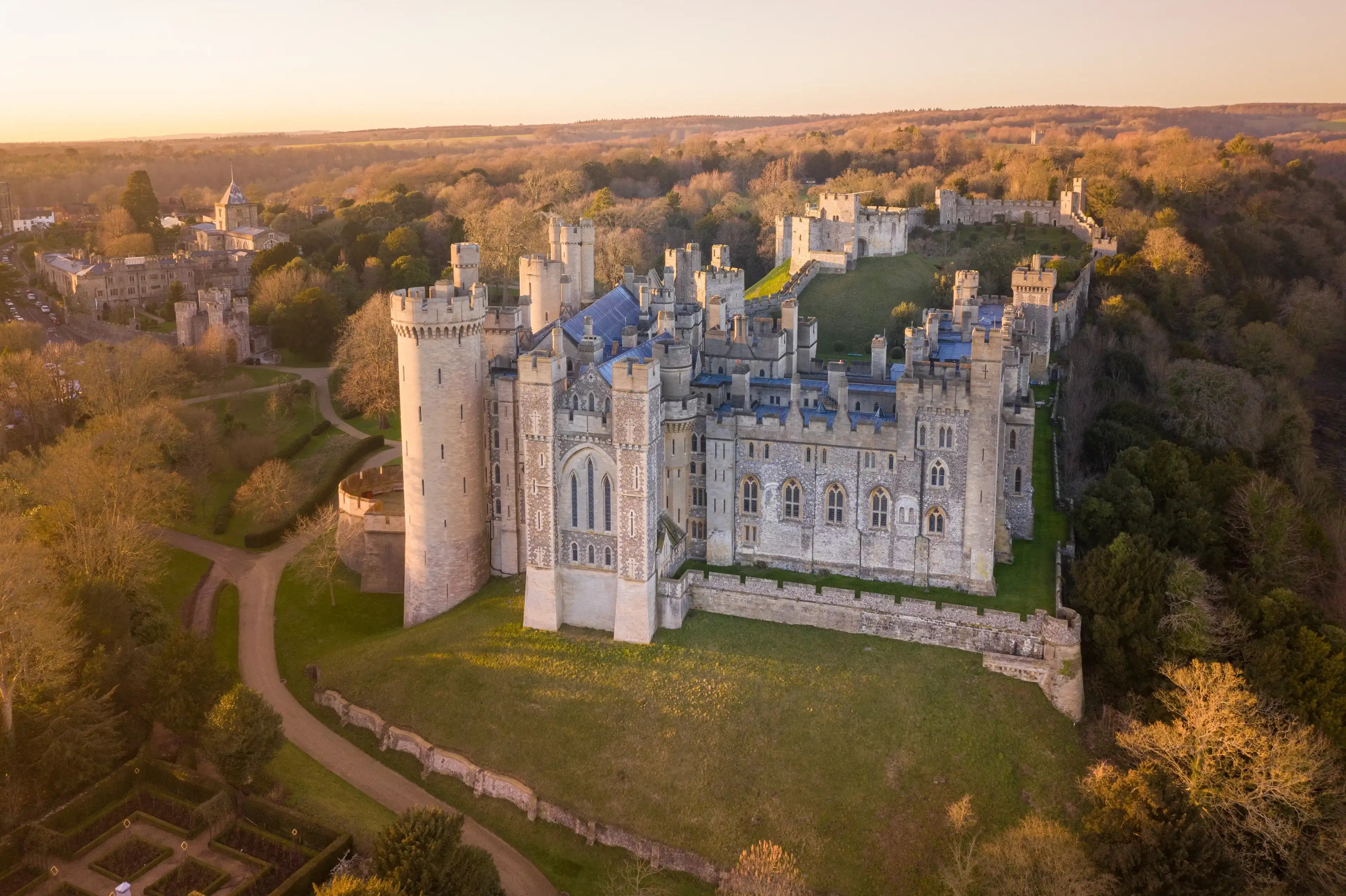 Arundel Castle, Arundel, West Sussex, England, United Kingdom. Bird Eye View. Beautiful Sunset Light Arundel Castle, Arundel, West Sussex, England, United Kingdom. Bird Eye View. Beautiful Sunset Light