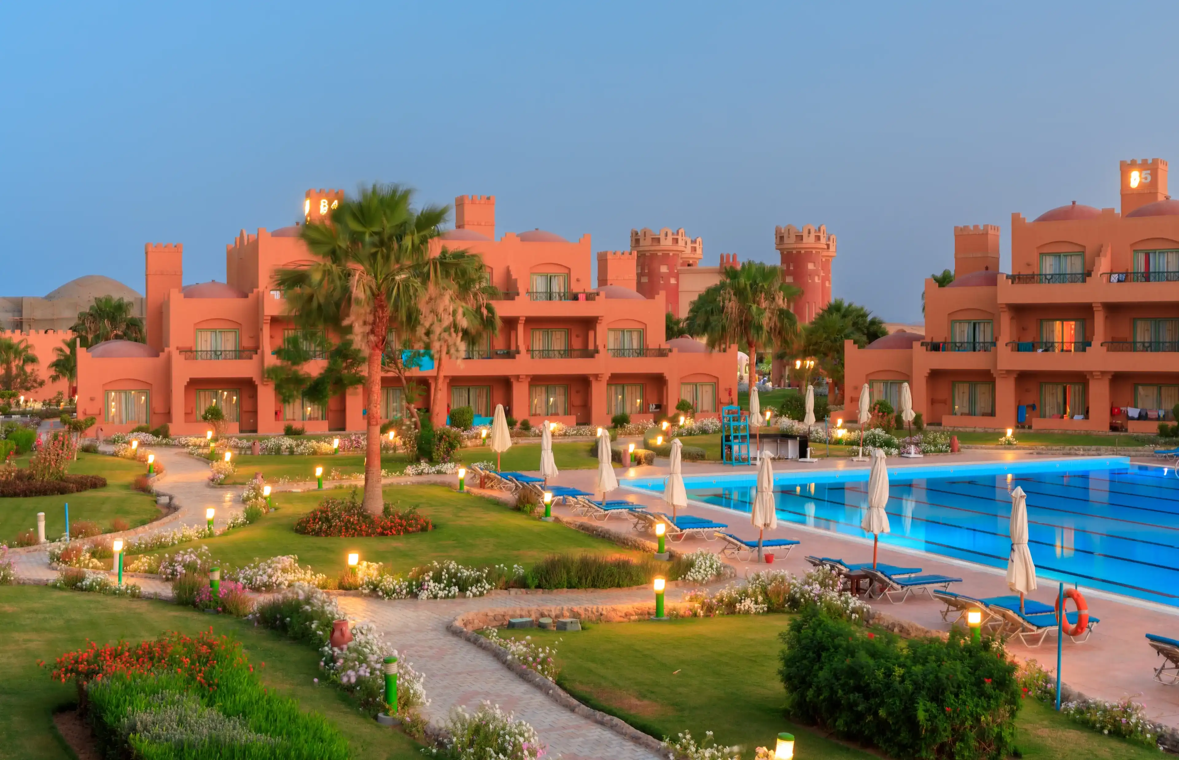 Marsa Alam, Egypt - May 11, 2023: Beautiful gardens of the Akassia Swiss Resort by the Red Sea in Marsa Alam, Egypt. Marsa Alam, Egypt - May 11, 2023: Beautiful gardens of the Akassia Swiss Resort by the Red Sea in Marsa Alam, Egypt.