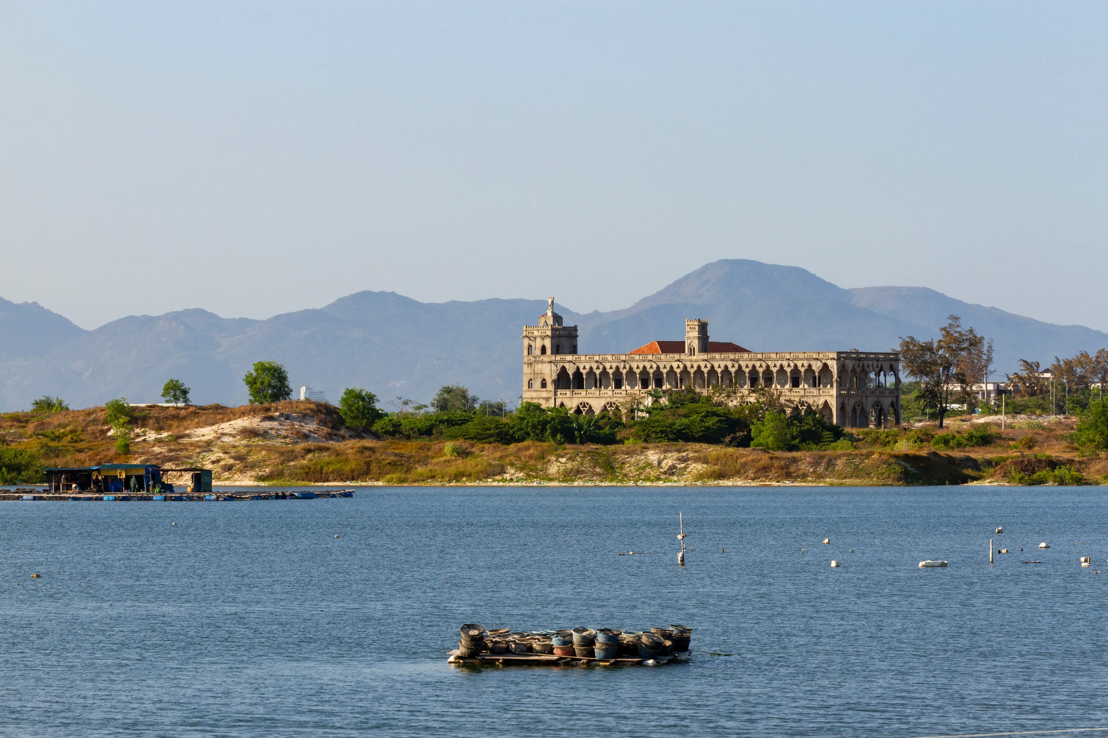 Beautiful Landscape Of A Old Catholic Monastery With Lake And Mountains In Cam Ranh, Vietnam.