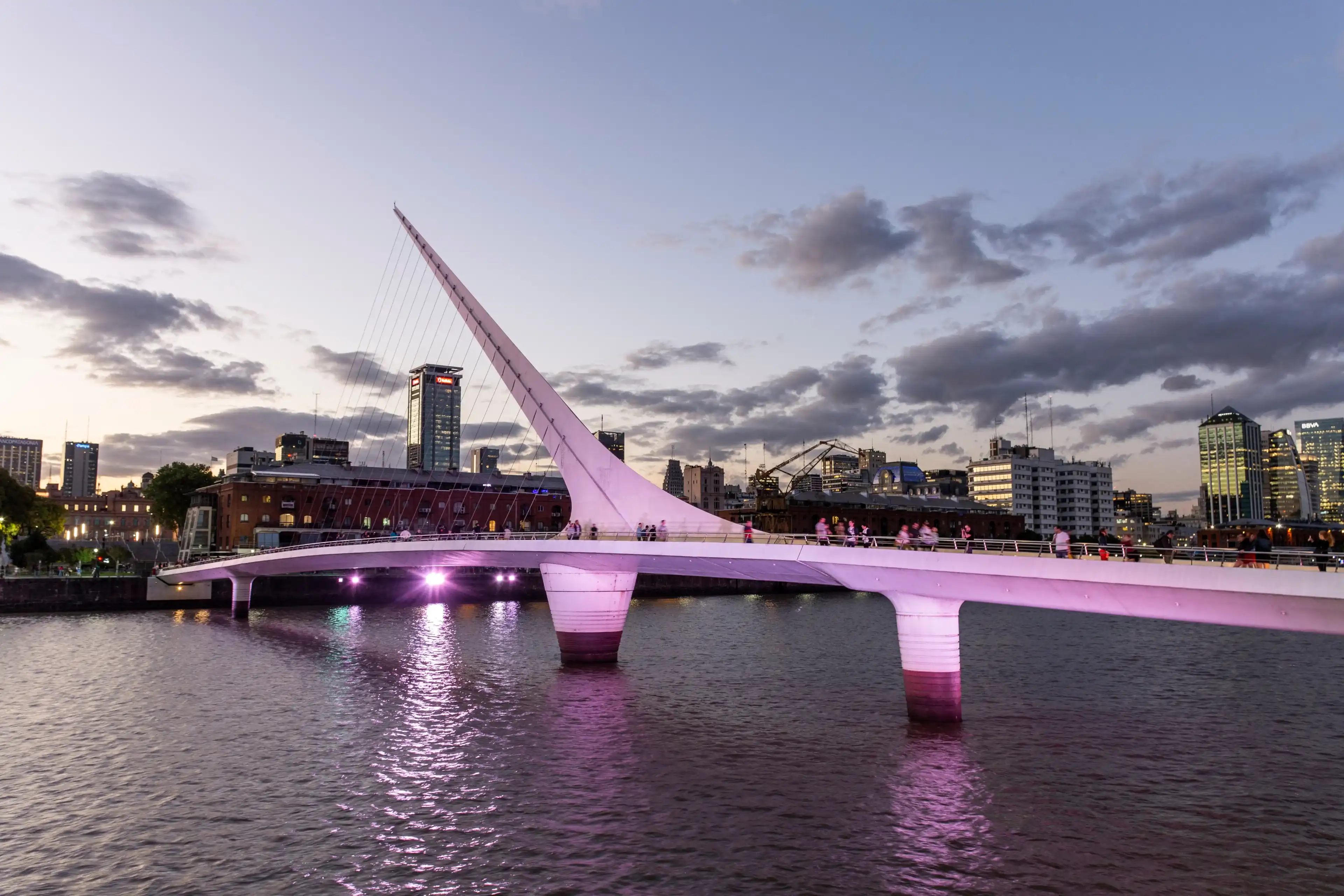 BUENOS AIRES, ARGENTINA - JANUARY 23, 2020: Beautiful view to modern bridge with pink light and buildings