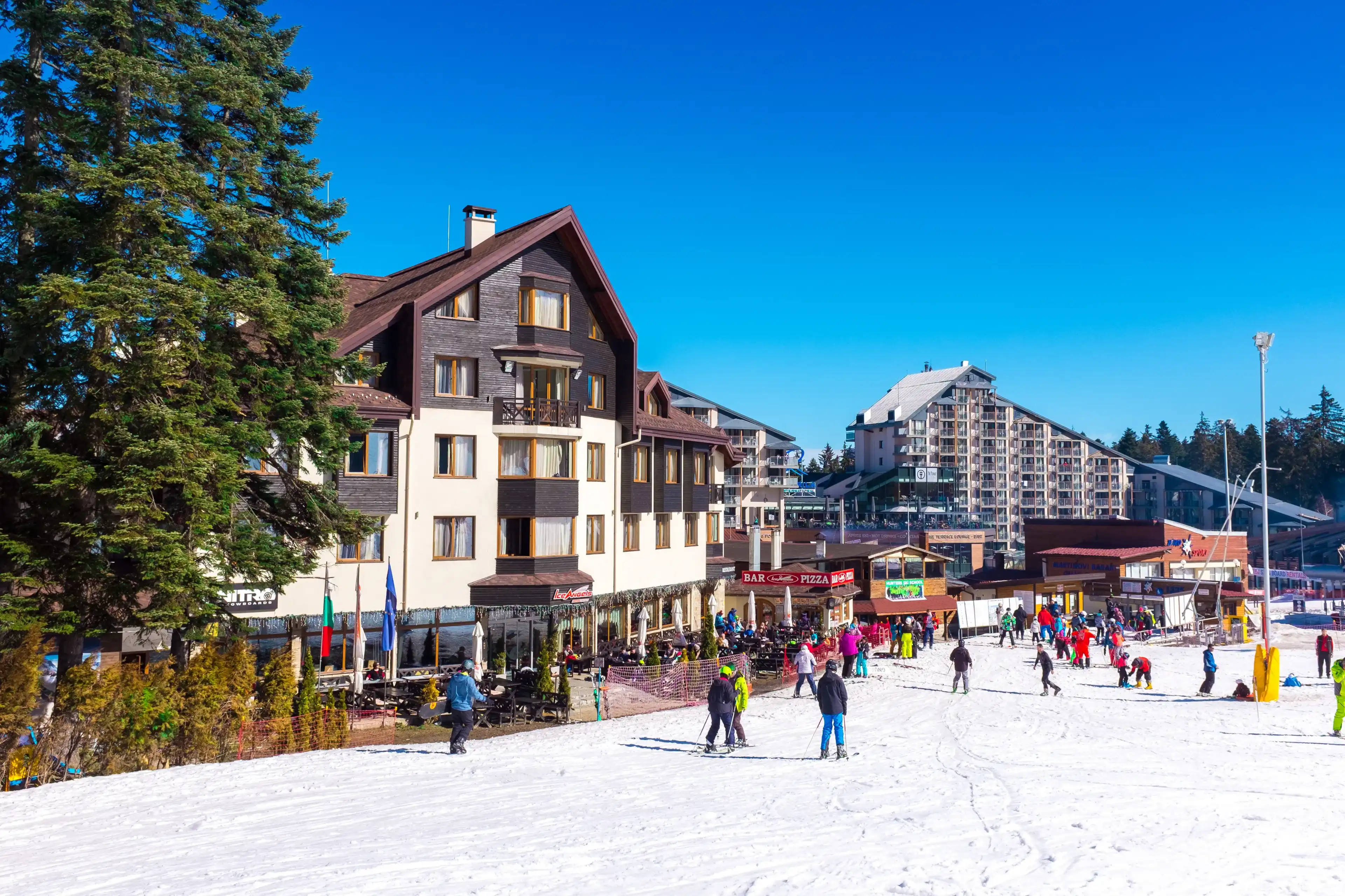 BOROVETS, BULGARIA- MARCH 09: Skiers are having a lunch break on March 09, 2018 in Borovets, Bulgaria, Borovets is a town in southwestern Bulgaria- popular ski resort. BOROVETS, BULGARIA- MARCH 09: Skiers are having a lunch break on March 09, 2018 in Borovets, Bulgaria, Borovets is a town in southwestern Bulgaria- popular ski resort.