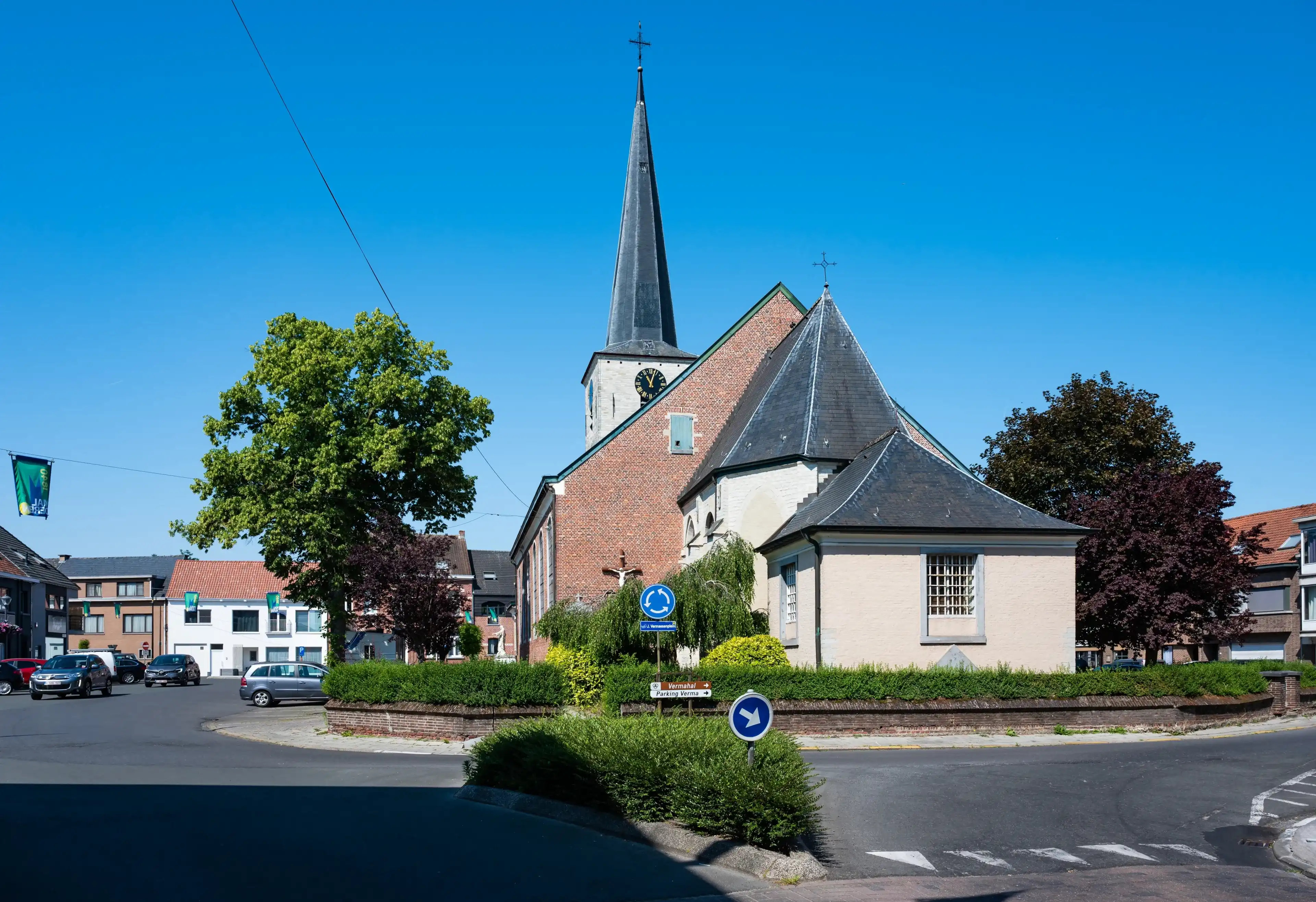 Buggenhout, East Flemish Region, Belgium, June 11, 2023 - Village roundabout and catholic church