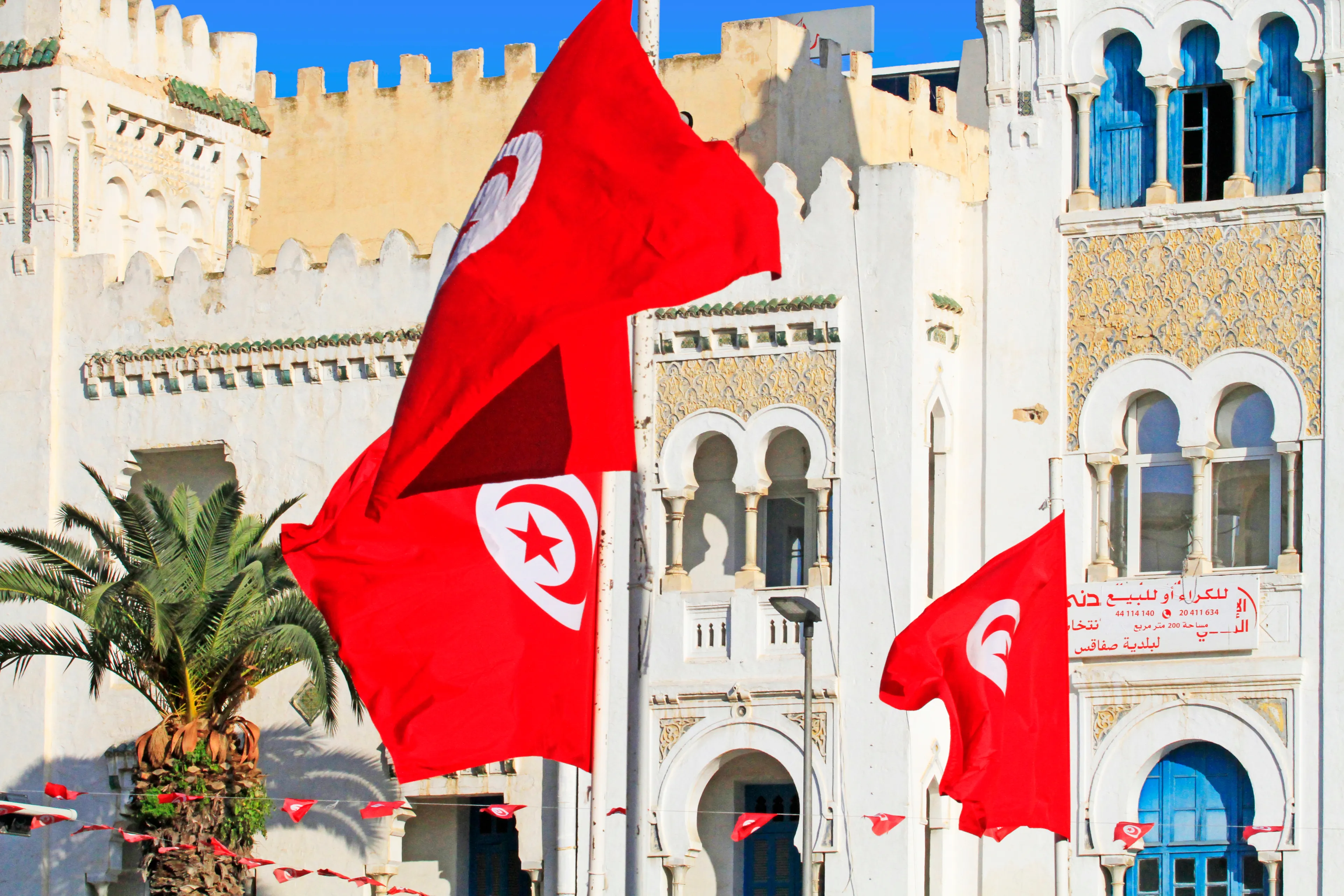 City of Sfax, Sfax Governorate / Tunisia - around March 2019 : Tunisian flags in a square of Sfax, Tunisia