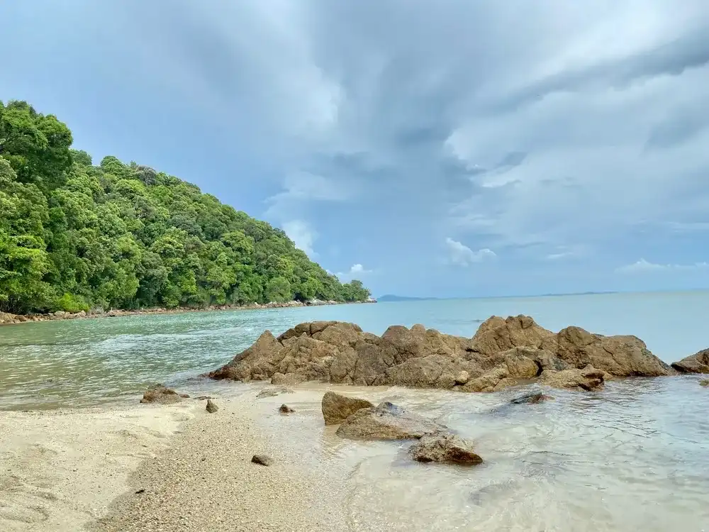 Natural beauty sea, hills, blue sky , beach together. Port dickson Malaysia.