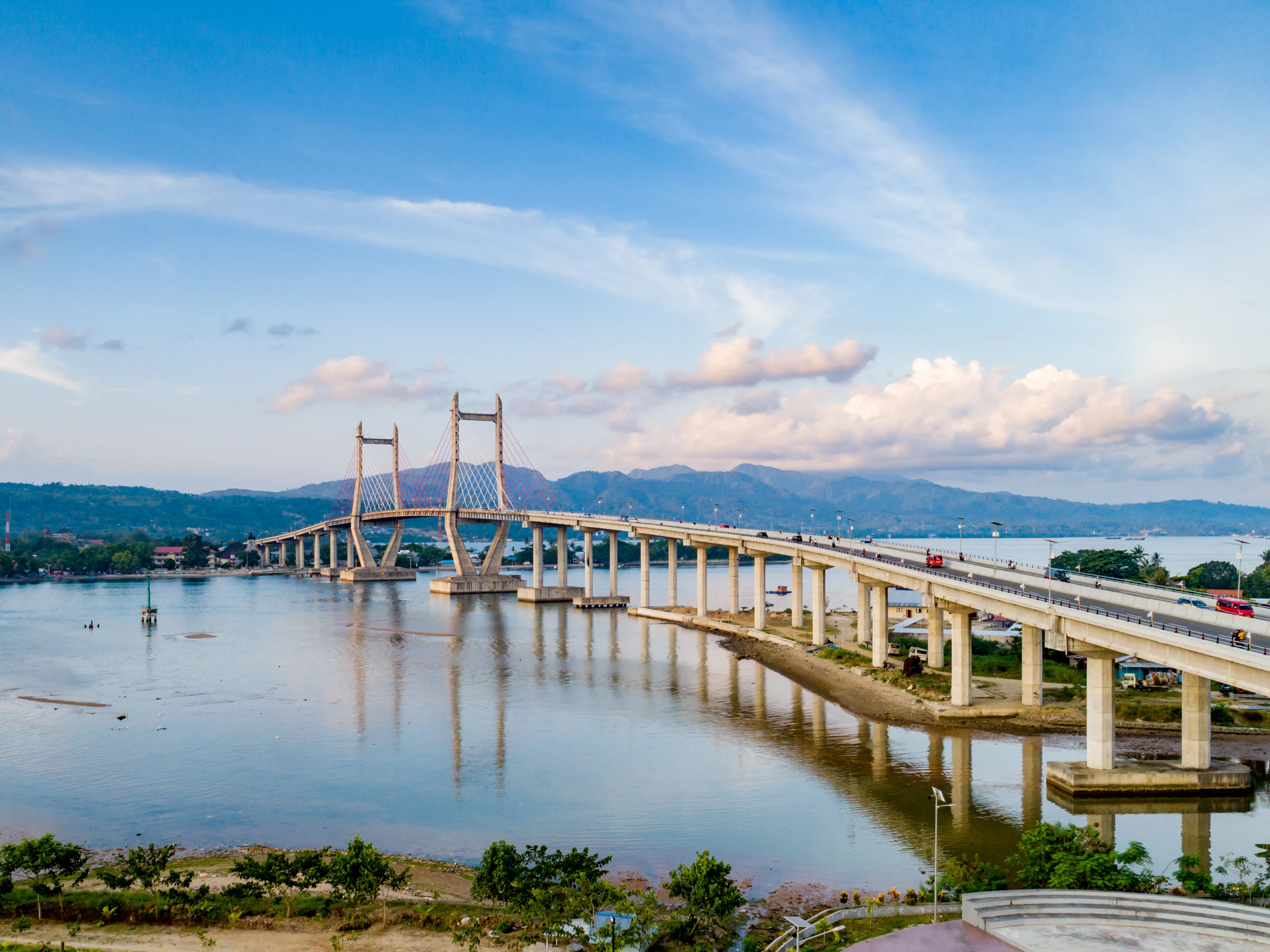 Scenic Aerial View of Iconic Merah Putih Cable Stayed Bridge accross Ambon Bay, Maluku, Indonesia