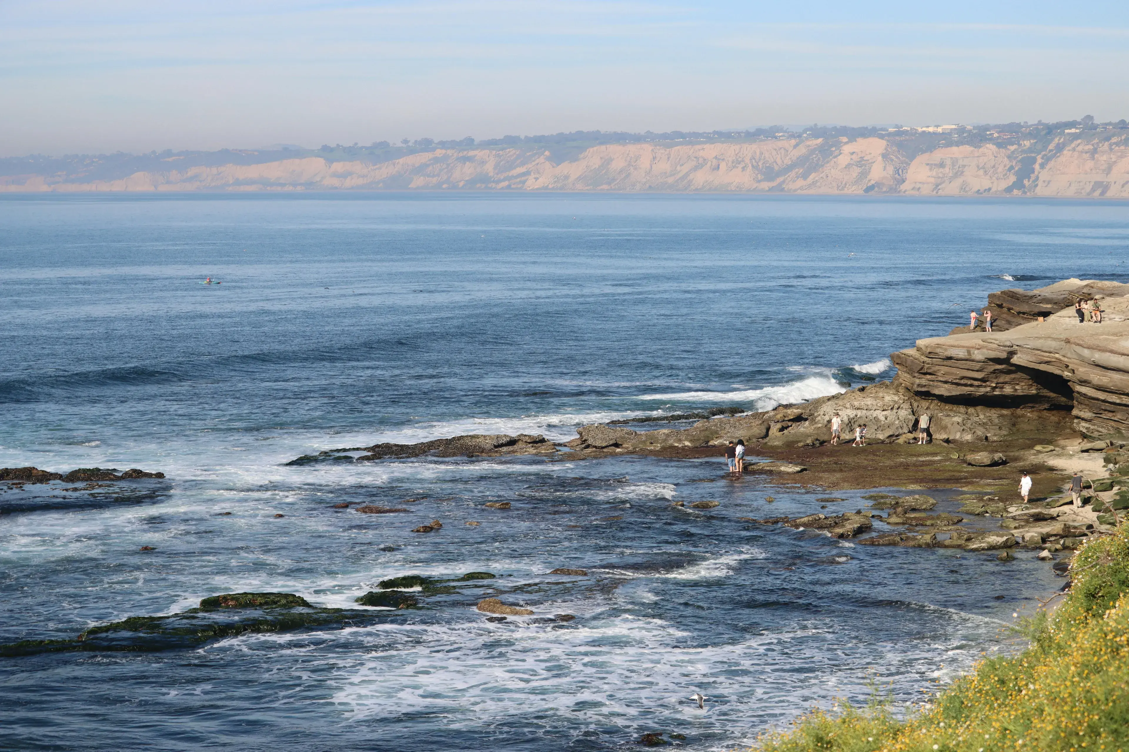 Explore the stunning coastline of La Jolla with ocean waves and rocky shores. Explore the stunning coastline of La Jolla with ocean waves and rocky shores.