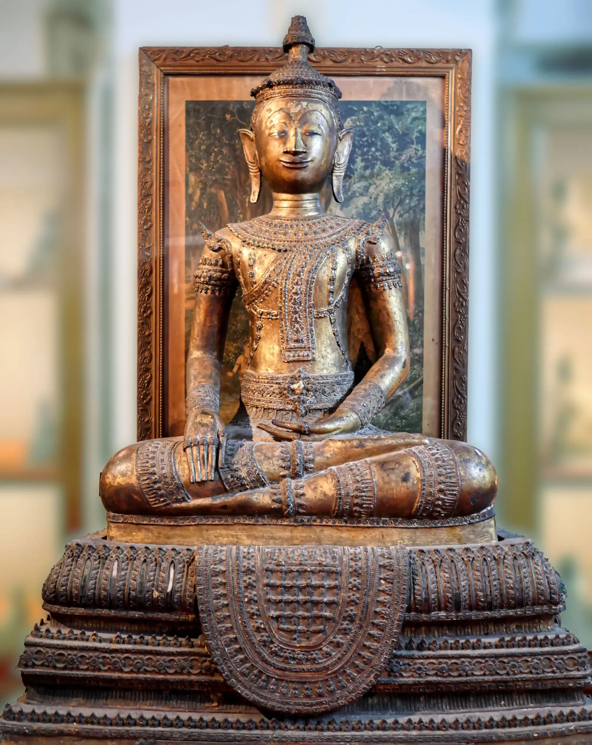 Intricate golden Buddha statue on display in a Bangkok museum Intricate golden Buddha statue on display in a Bangkok museum