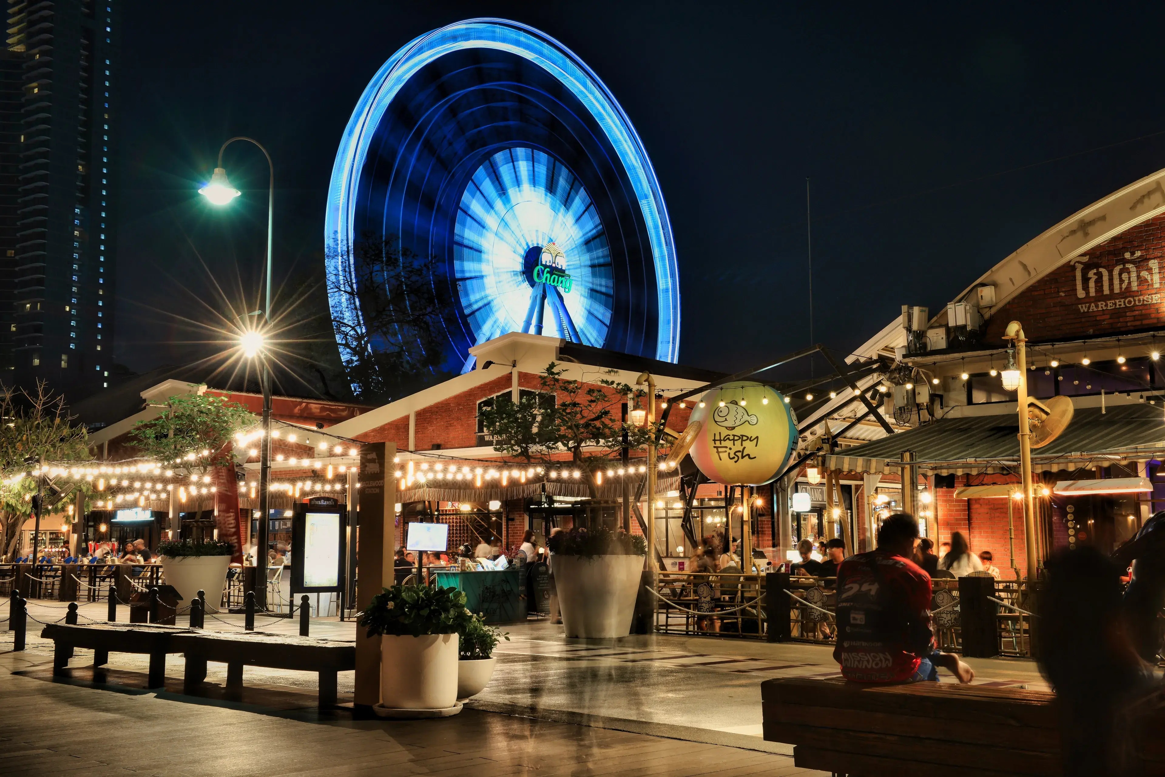 Night view of the illuminated ferris wheel at Asiatique Riverfront in Bangkok, Thailand Night view of the illuminated ferris wheel at Asiatique Riverfront in Bangkok, Thailand