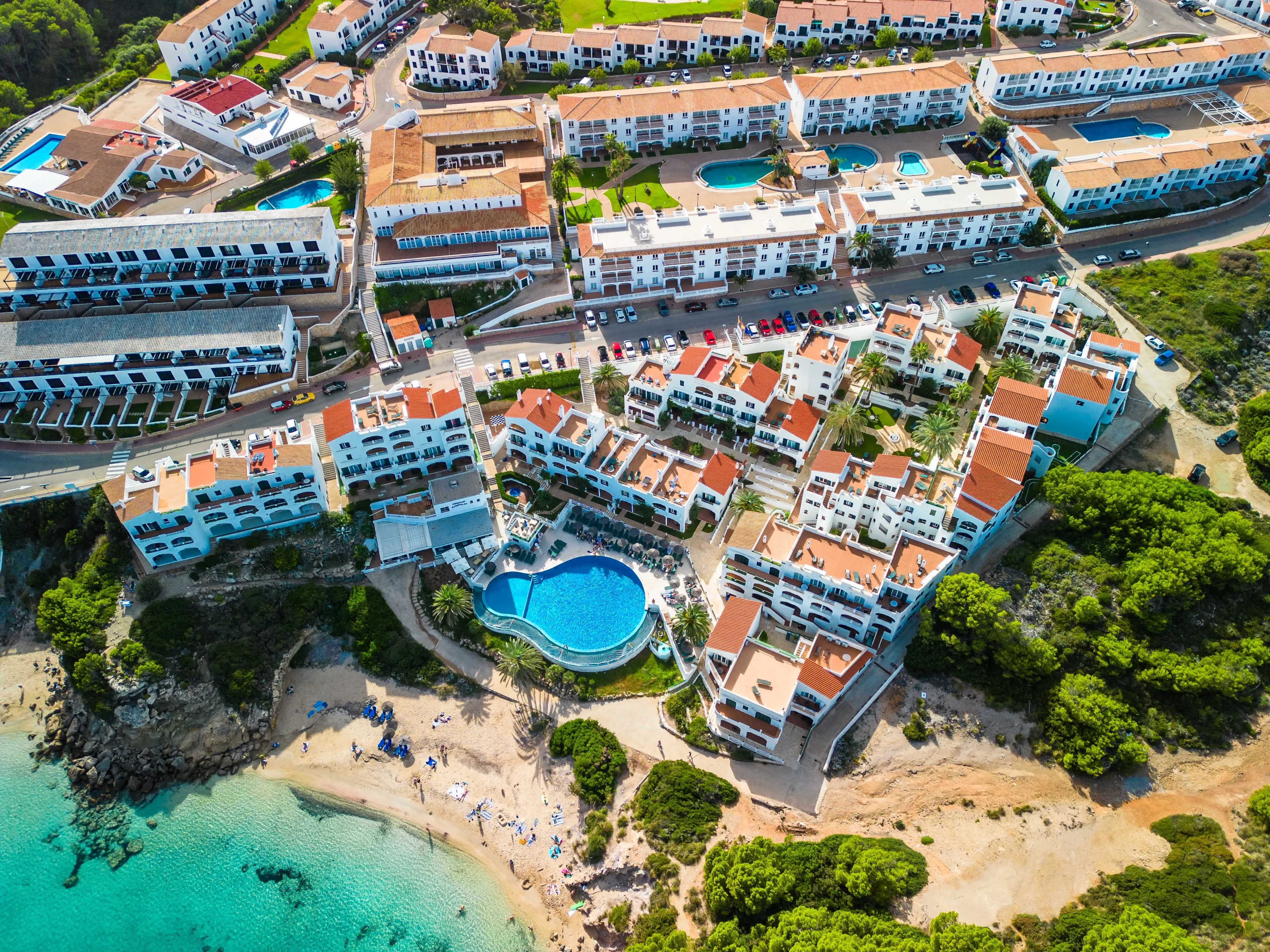 Areal drone view of beautiful bay and Arenal d'en Castell beach on Menorca island, Spain