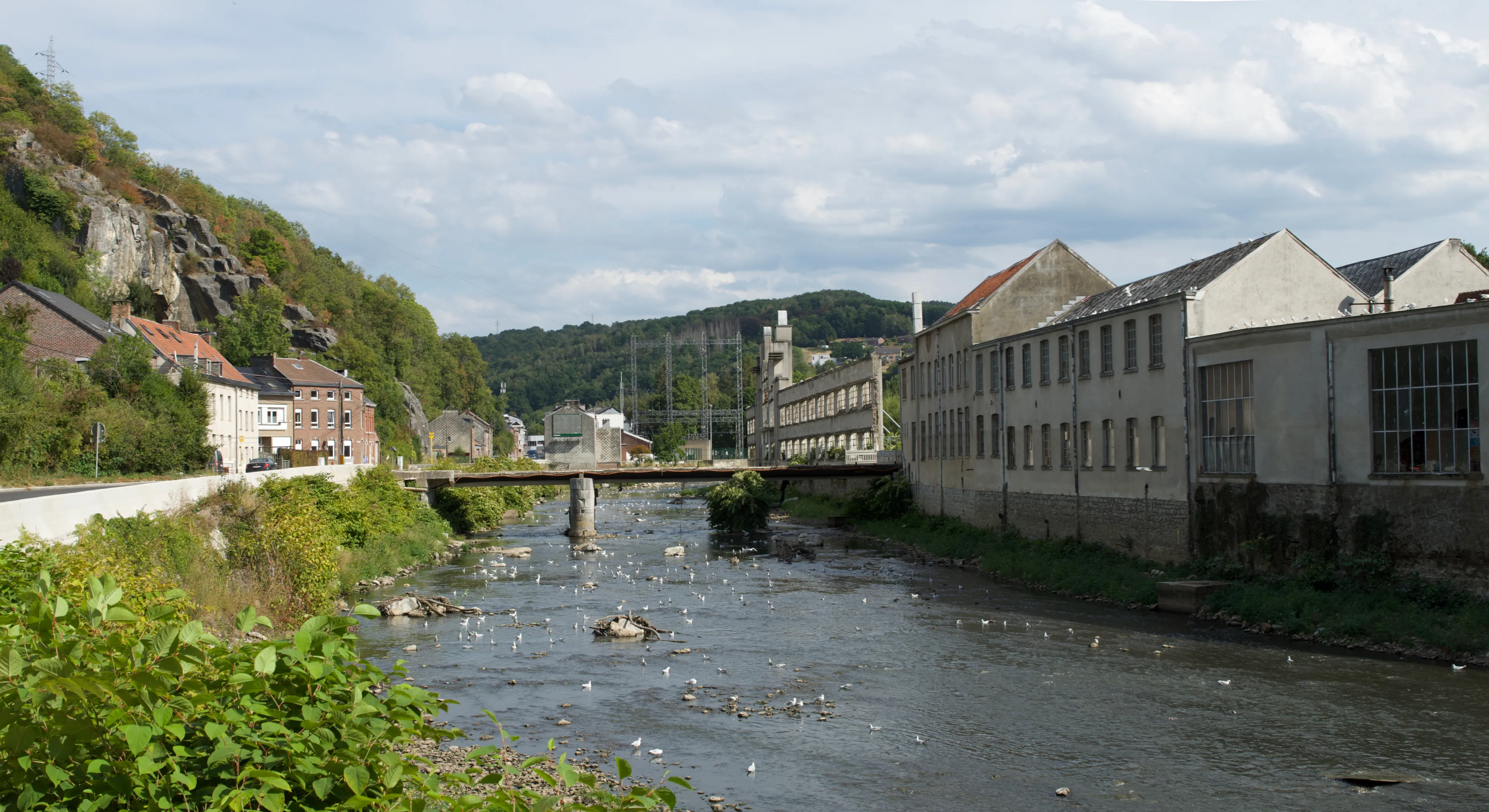 Pepinster, Province of Liège, Belgium - August, 30, 2022: La textile de Pepinster industrial heritage site, along the Vesdre river, has a more unstable outdoor surrounding garden wall after flood